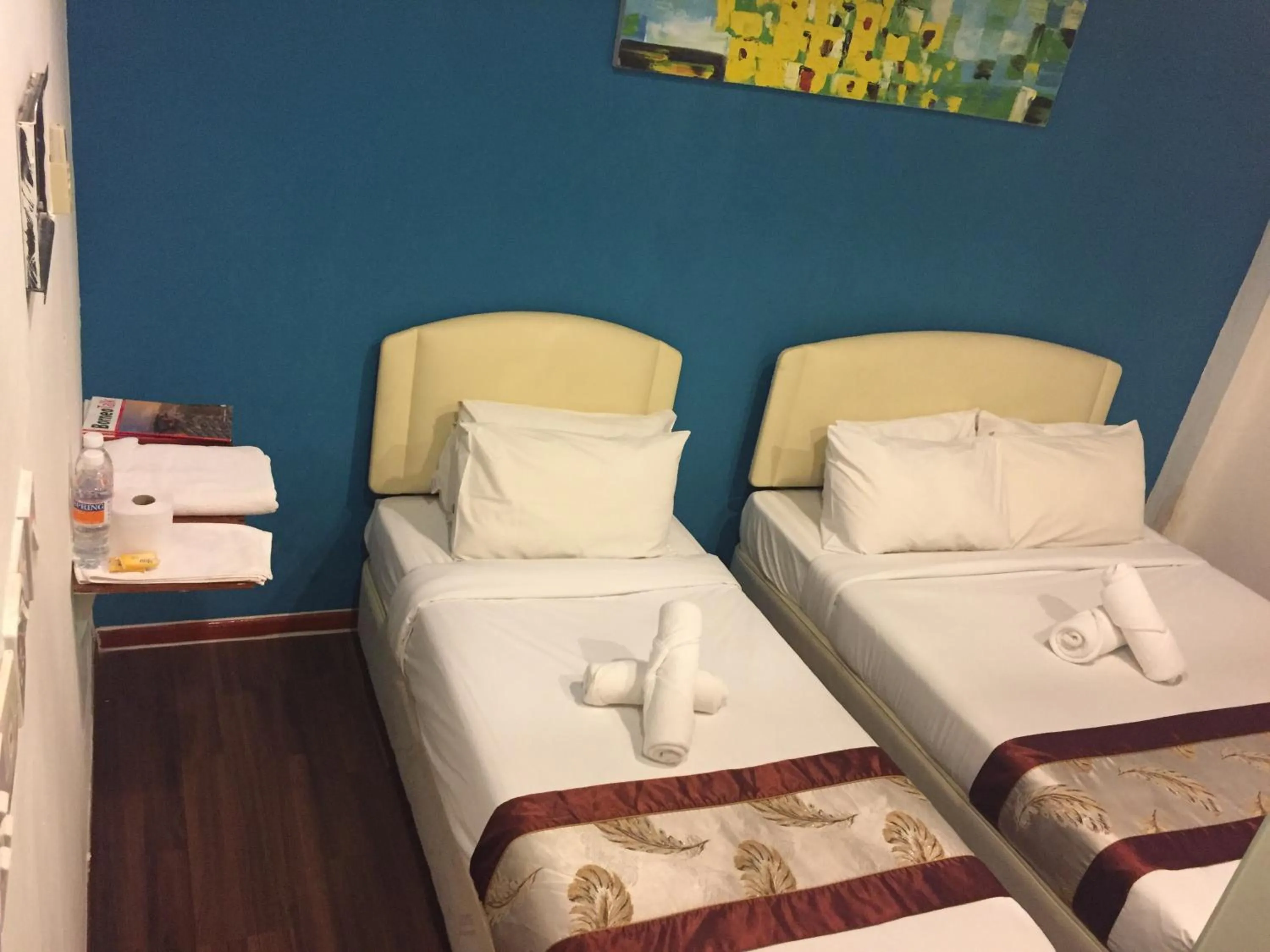 Standard Triple Room in Woodpecker Lodge, Kuching