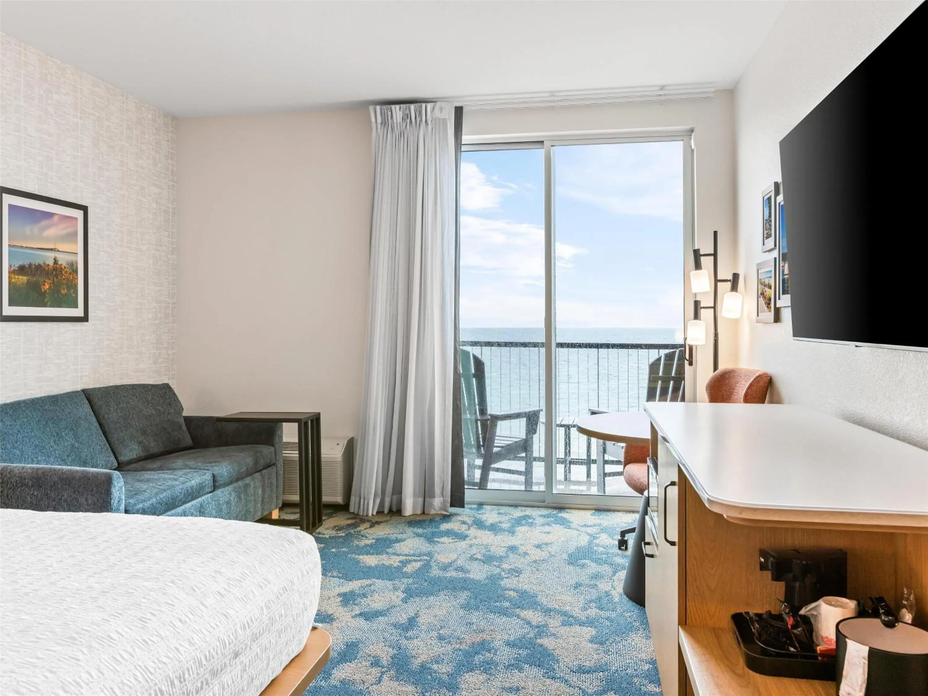 King Room with Sofa Bed and Balcony - Lake View/Patio in Hampton Inn St Ignace Lakefront Mackinac