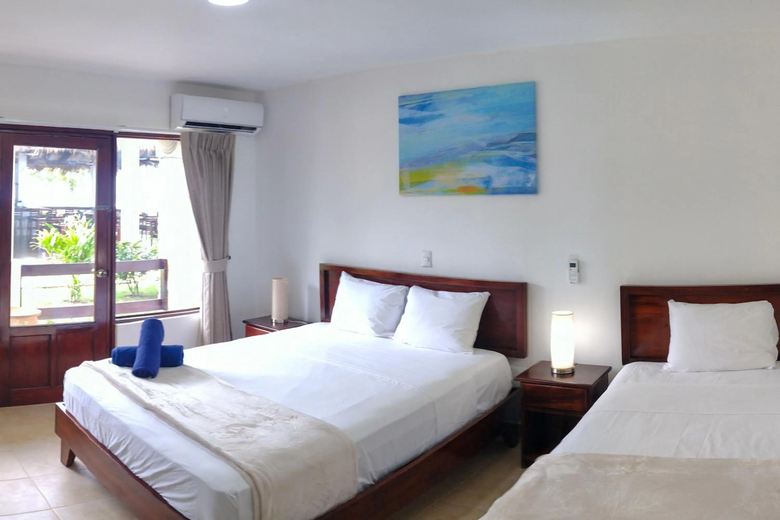 Standard Room  Plus 1 Queen Bed + 1 Twin Bed in Fuego del Sol Beachfront Hotel