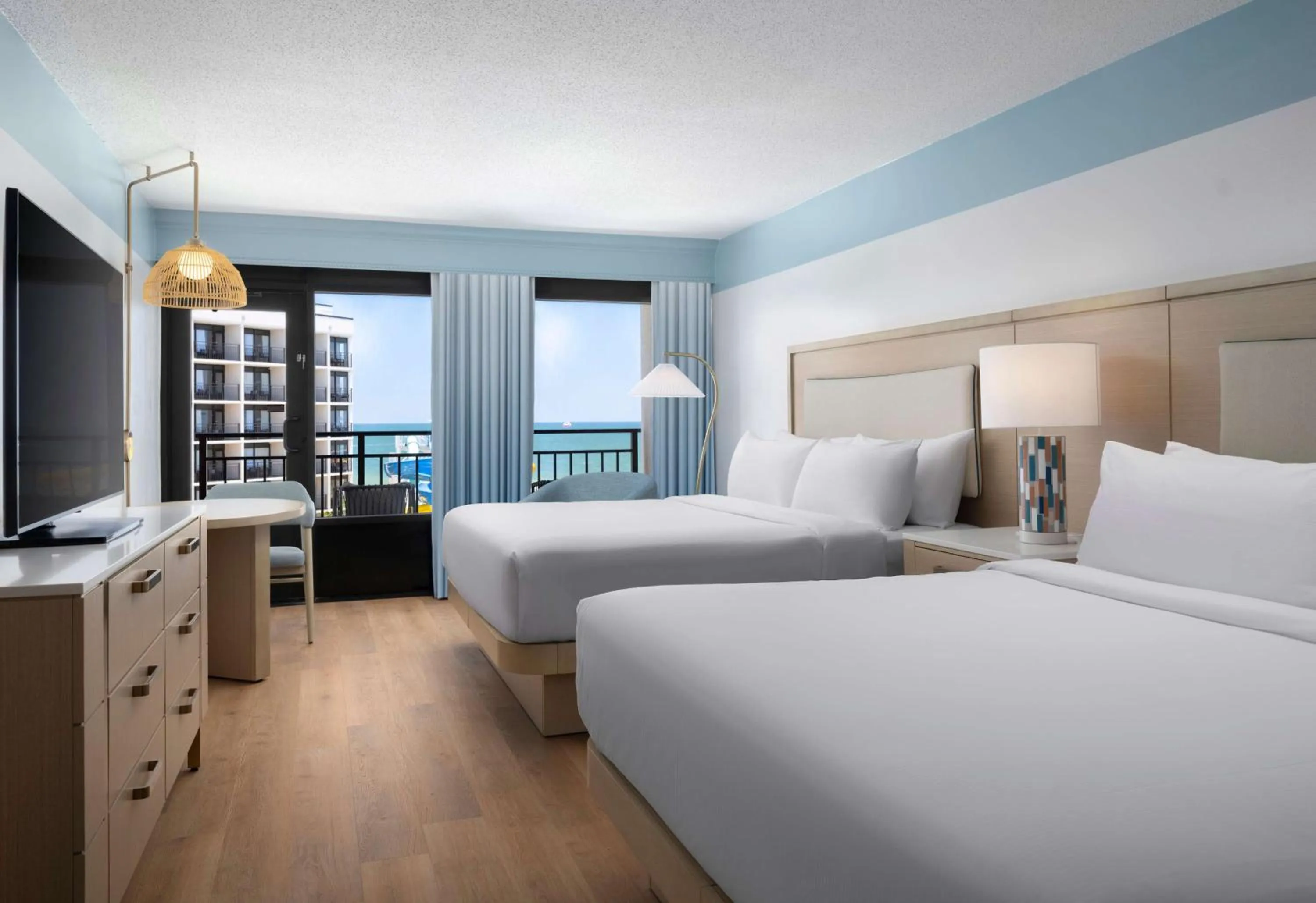 Queen Room with Two Queen Beds, Ocean View and Roll-in Shower - Mobility and Hearing Access in The Ellie Beach Resort Myrtle Beach, Tapestry By Hilton