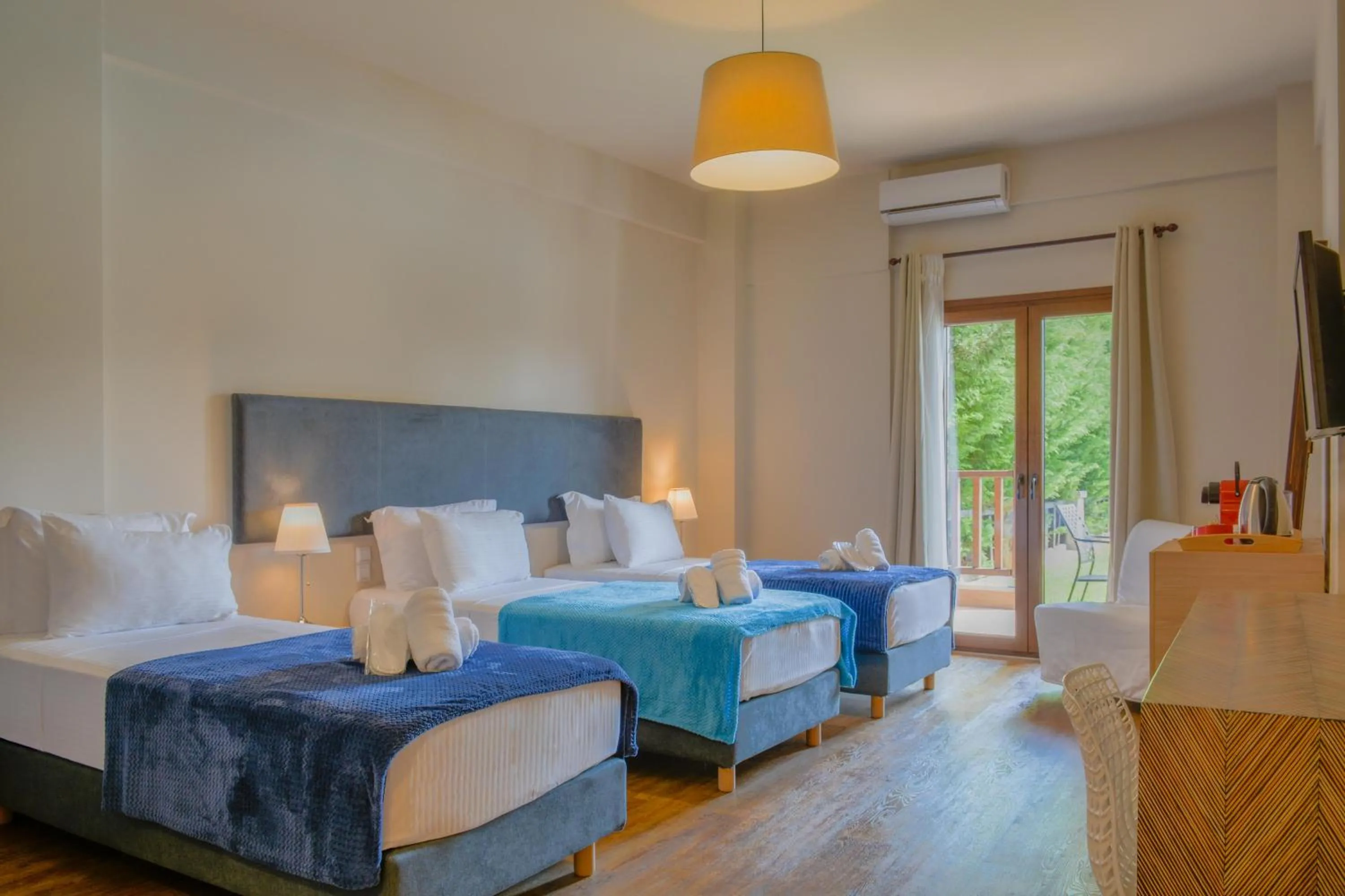 Superior Triple Room with Pool View in Monastiri Guesthouse