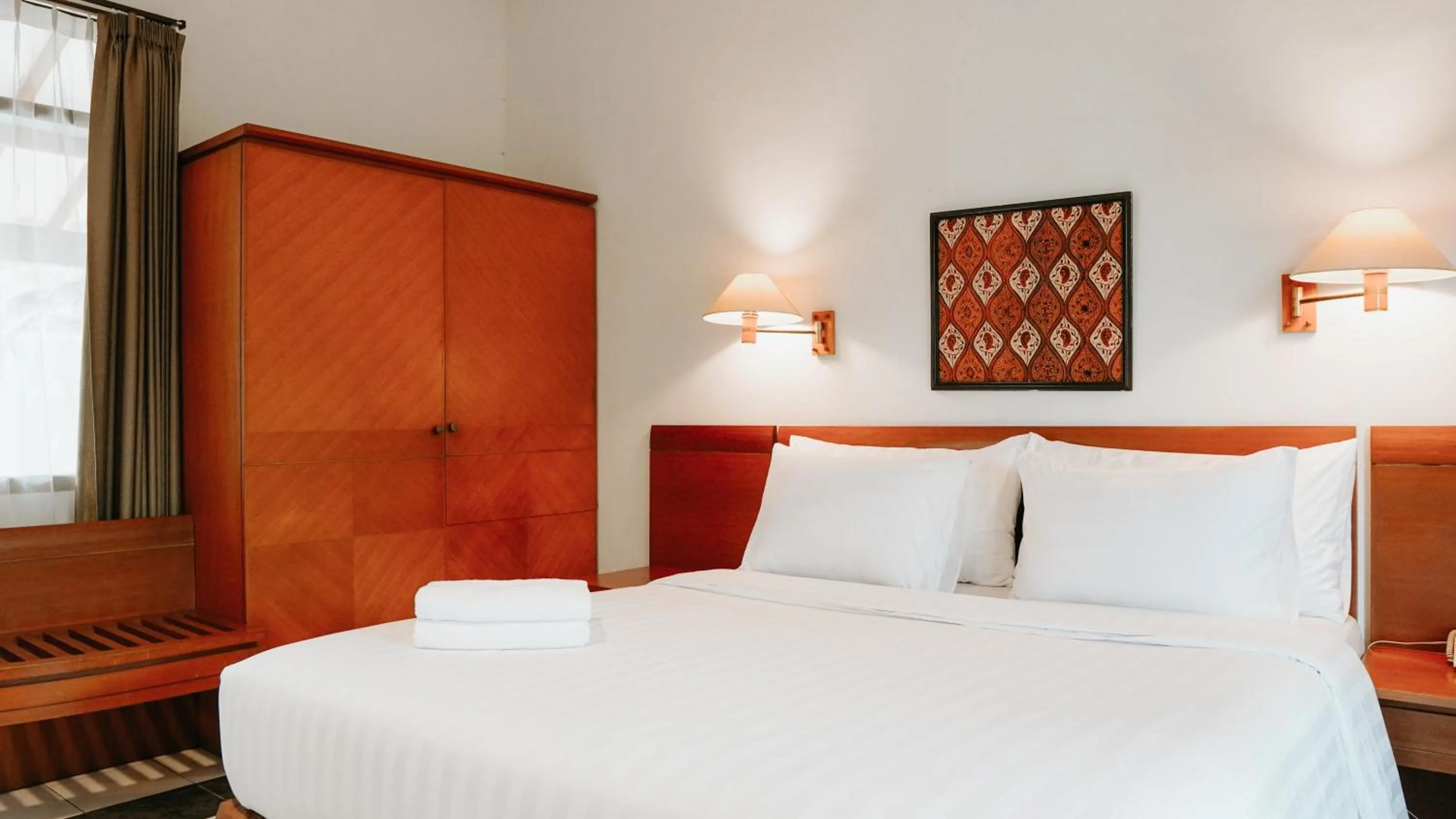 Deluxe Double Room (2 Adults + 1 Child) - single occupancy in Tidar Hotel & Cottages Malang