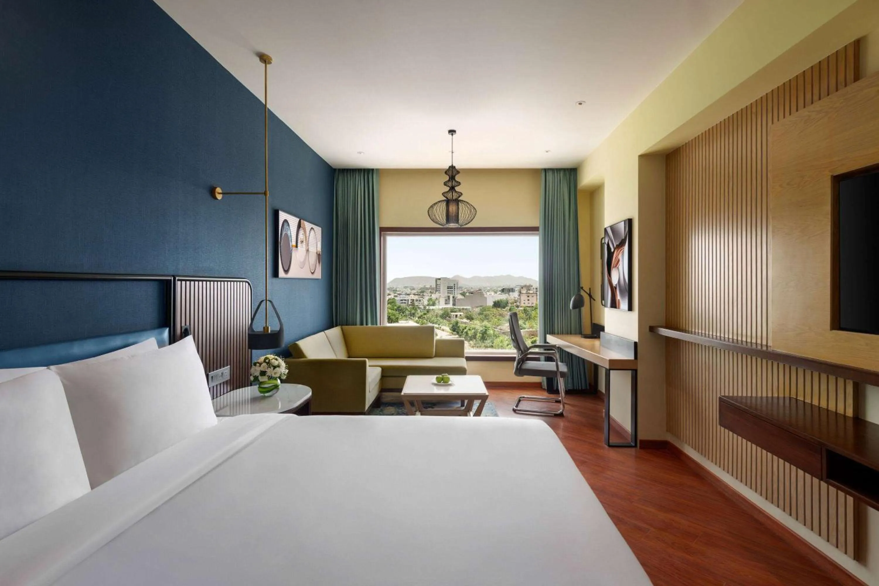 Deluxe King Room - single occupancy in Ramada Encore by Wyndham Udaipur Roopnagar