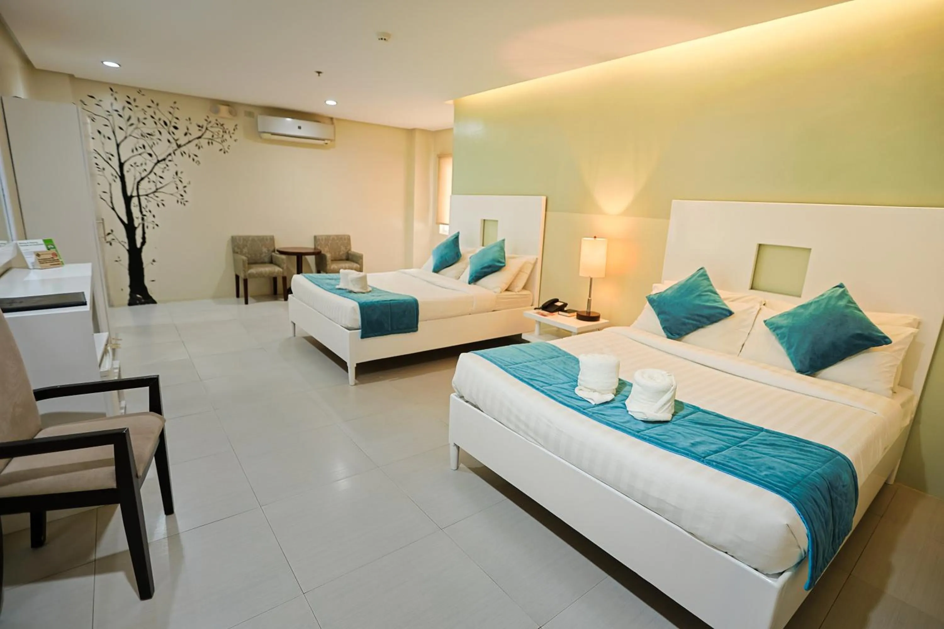 Family Room in Holiday Suites Business District - formerly Empire Suites Hotel