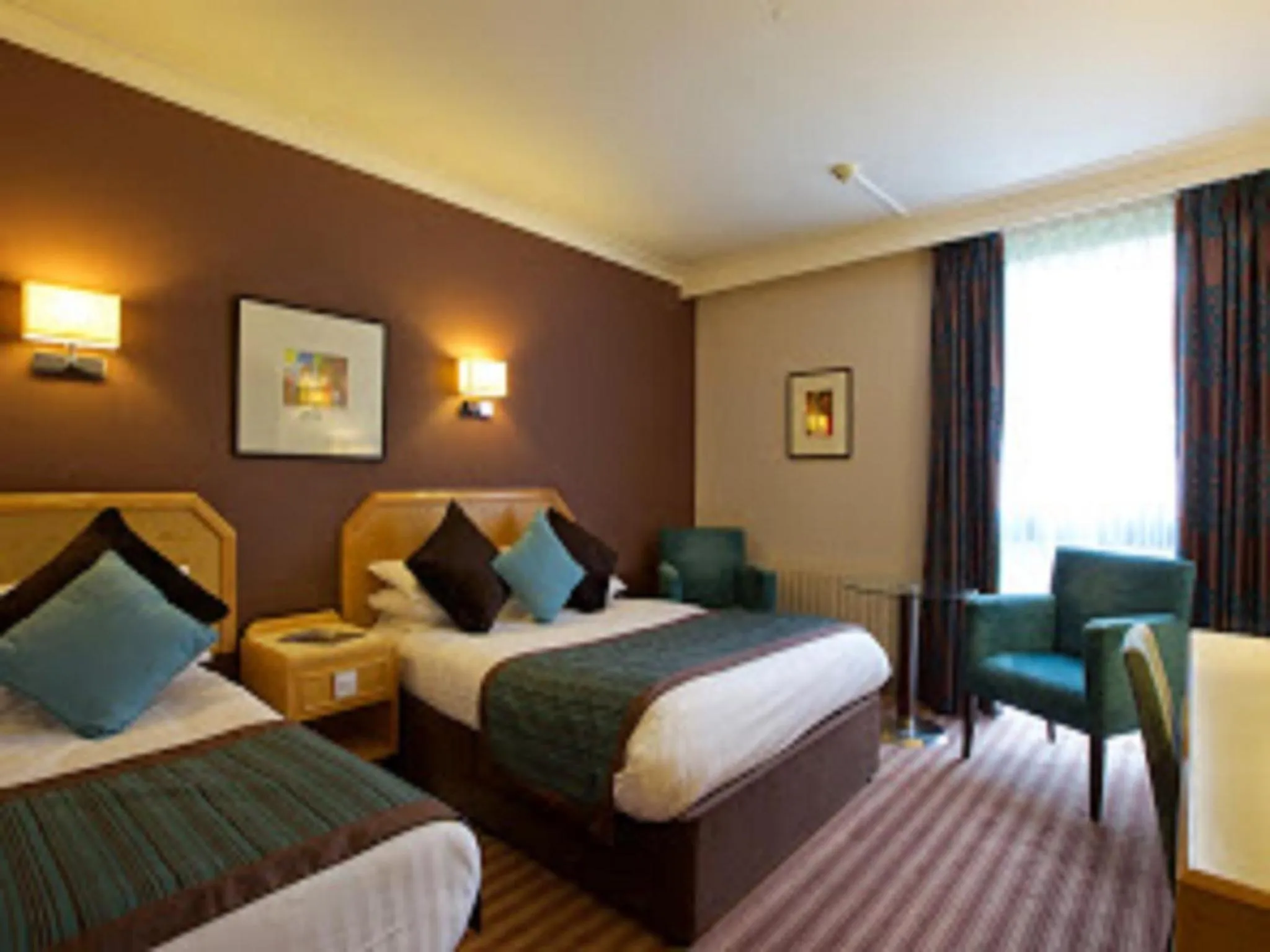 Family Room with Double and Two Single Beds in Stourport Manor Hotel