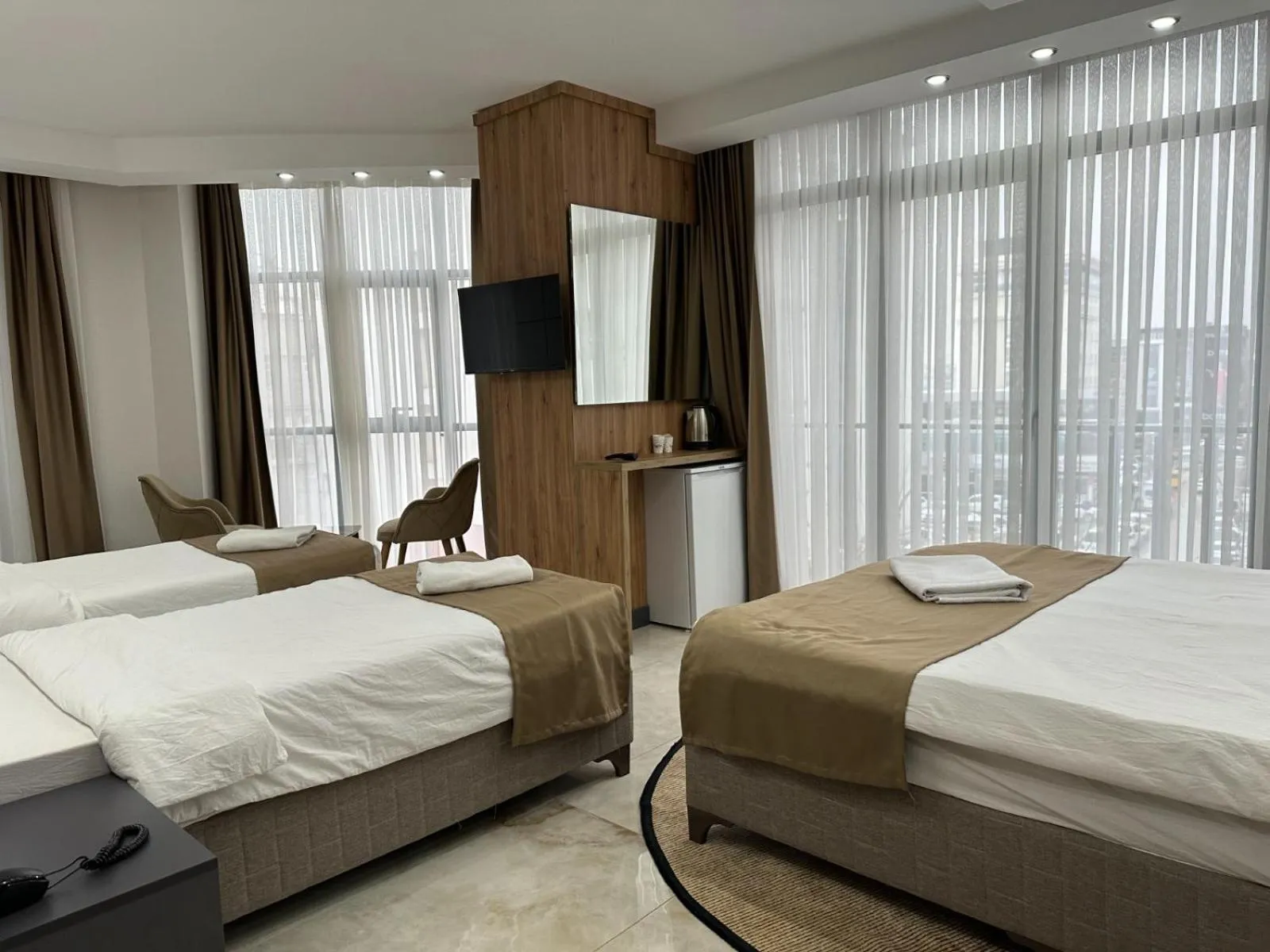 Deluxe Quadruple Room in Pars Palas Hotel