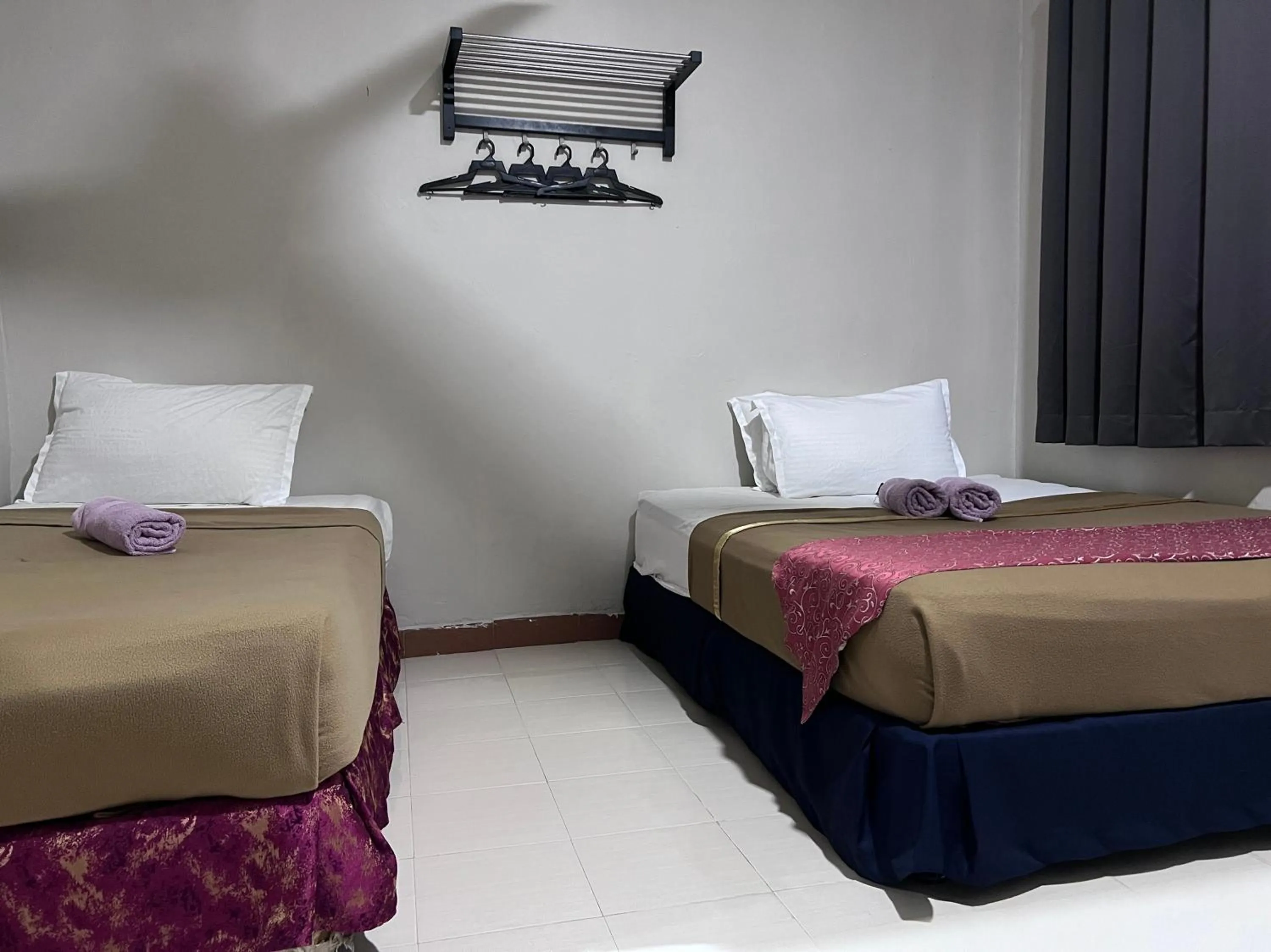 Deluxe Triple Room in Capital O 91017 Tuba Beach Resort @ Pulau Tuba