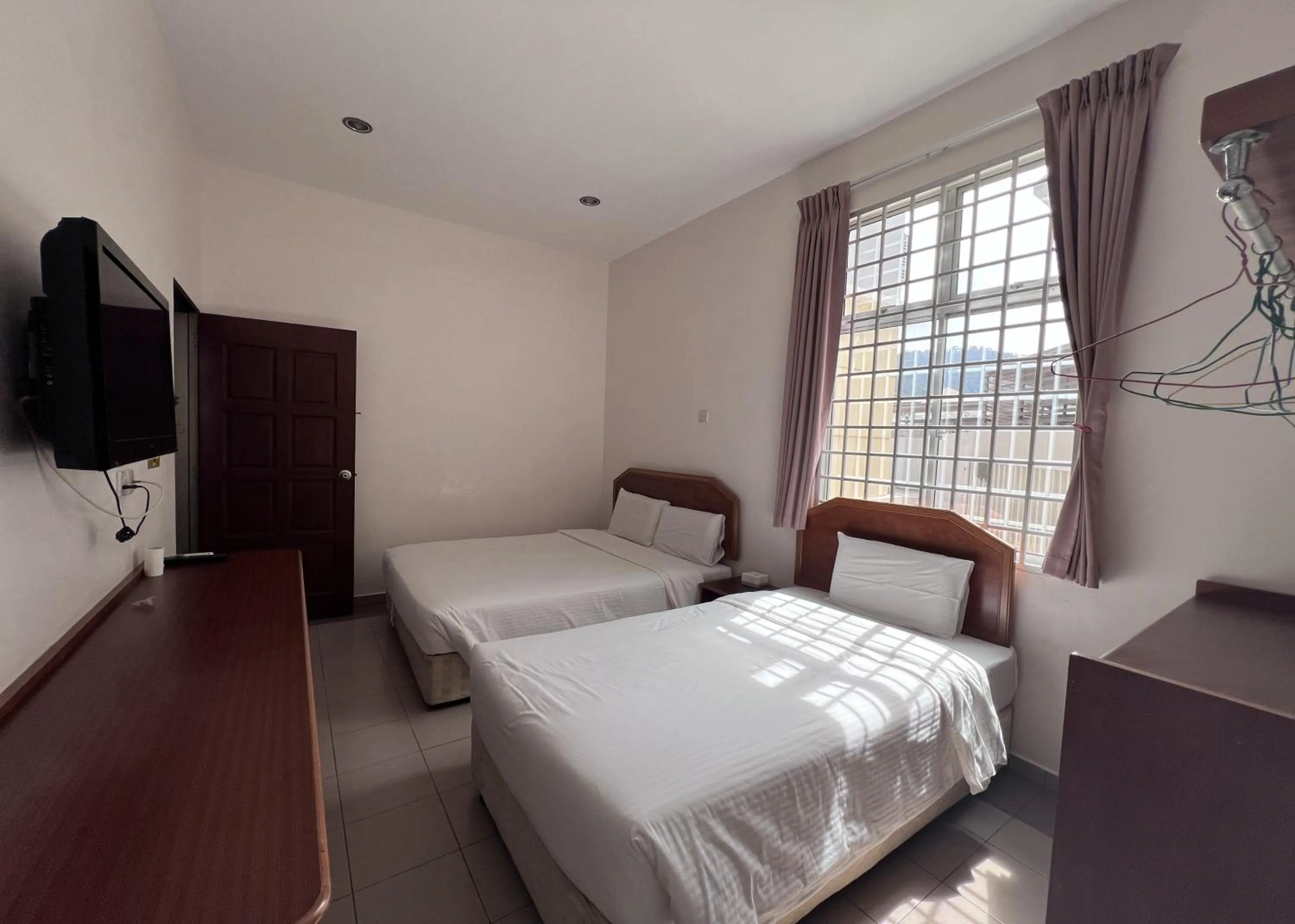 Standard Triple Room in SL Villa Guesthouse, Kuantan