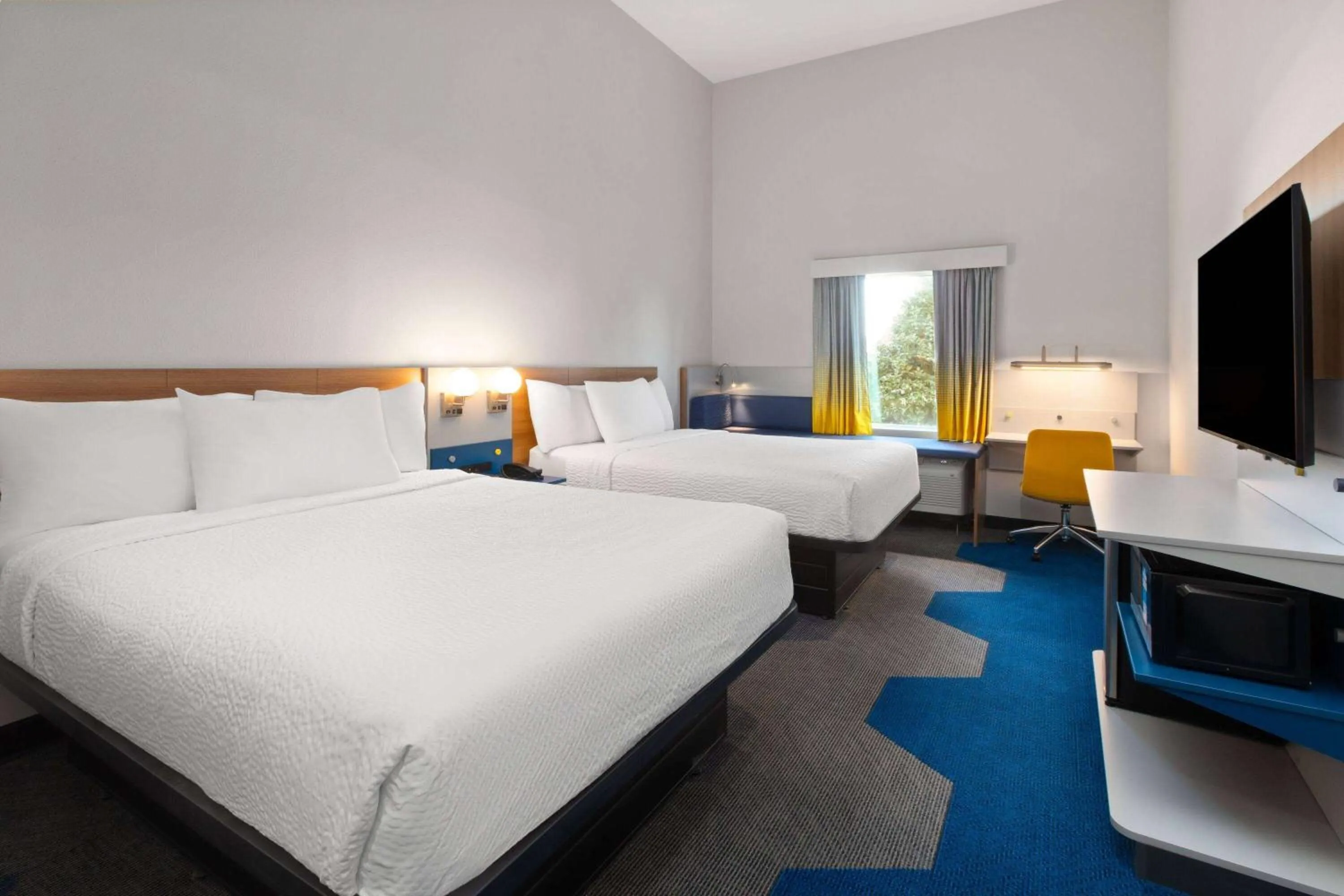 Queen Room with Two Queen Beds - Non-Smoking in Microtel Inn & Suites by Wyndham Olive Branch