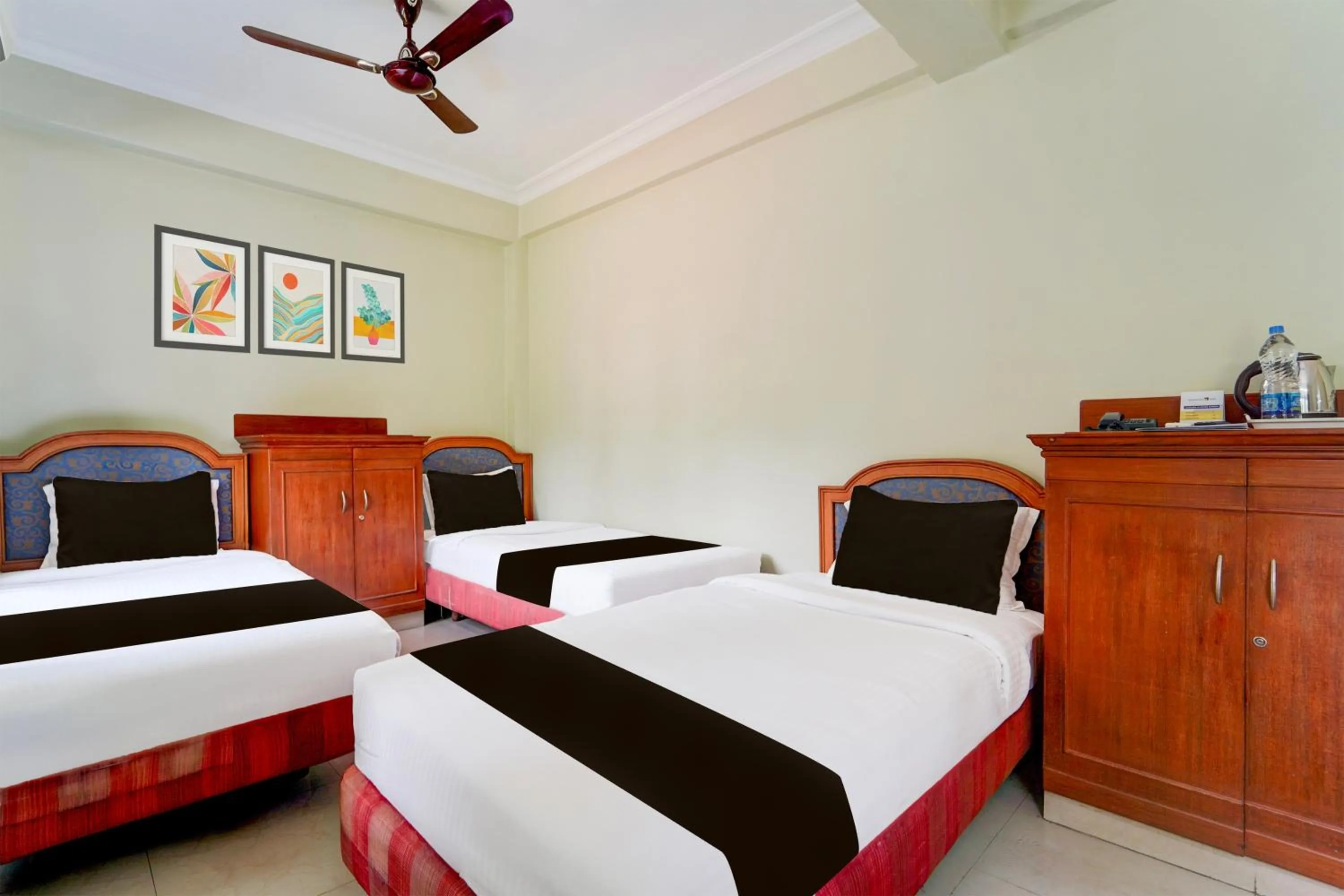 Classic Triple Room - single occupancy in Super Townhouse MG Road Trivandrum Formerly Nandanam Park