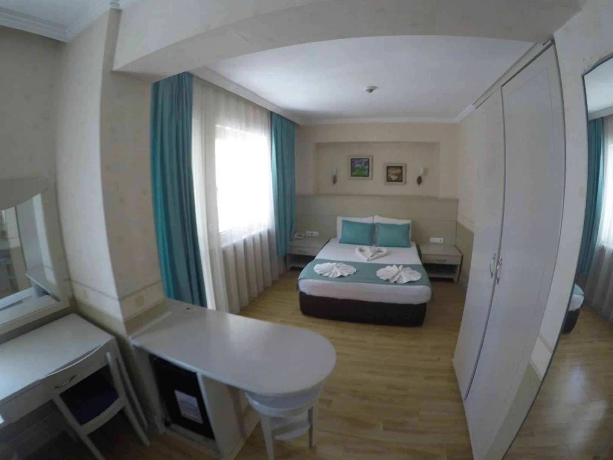 Standard Triple Room in Almena Hotel