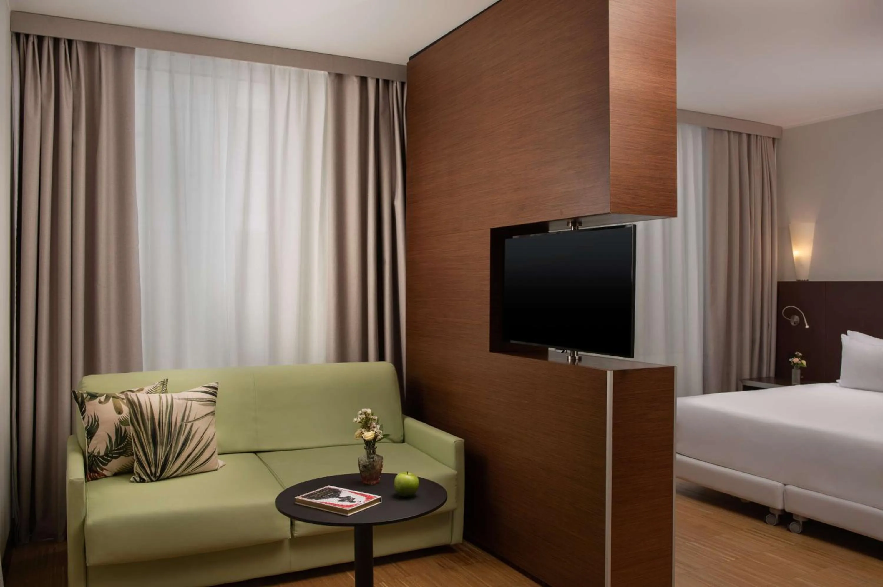 Junior Suite with Extra Bed (2 Adults + 1 Child) in NH Savona Darsena
