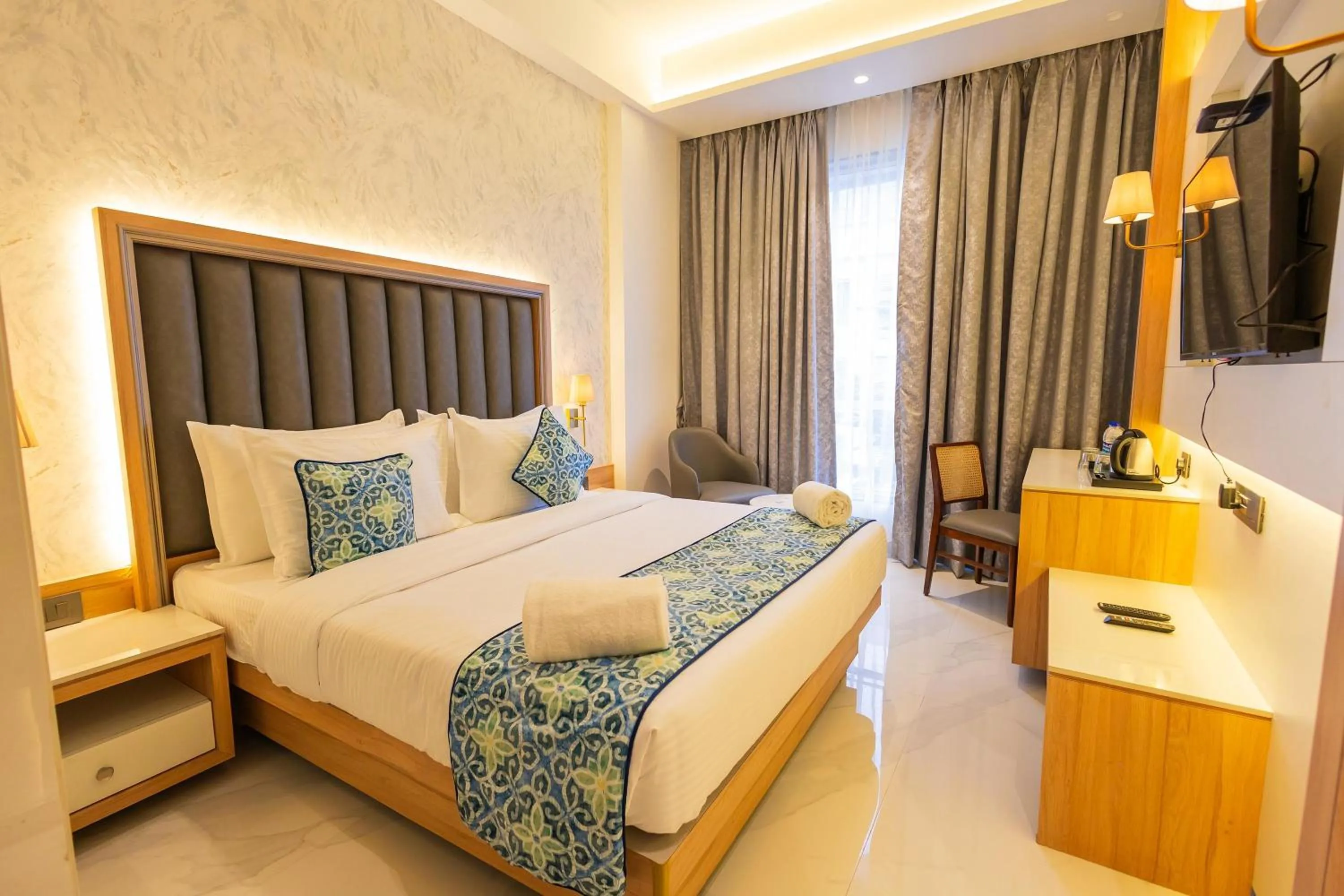 Deluxe King Room - single occupancy in Shera Hotels & Banquets