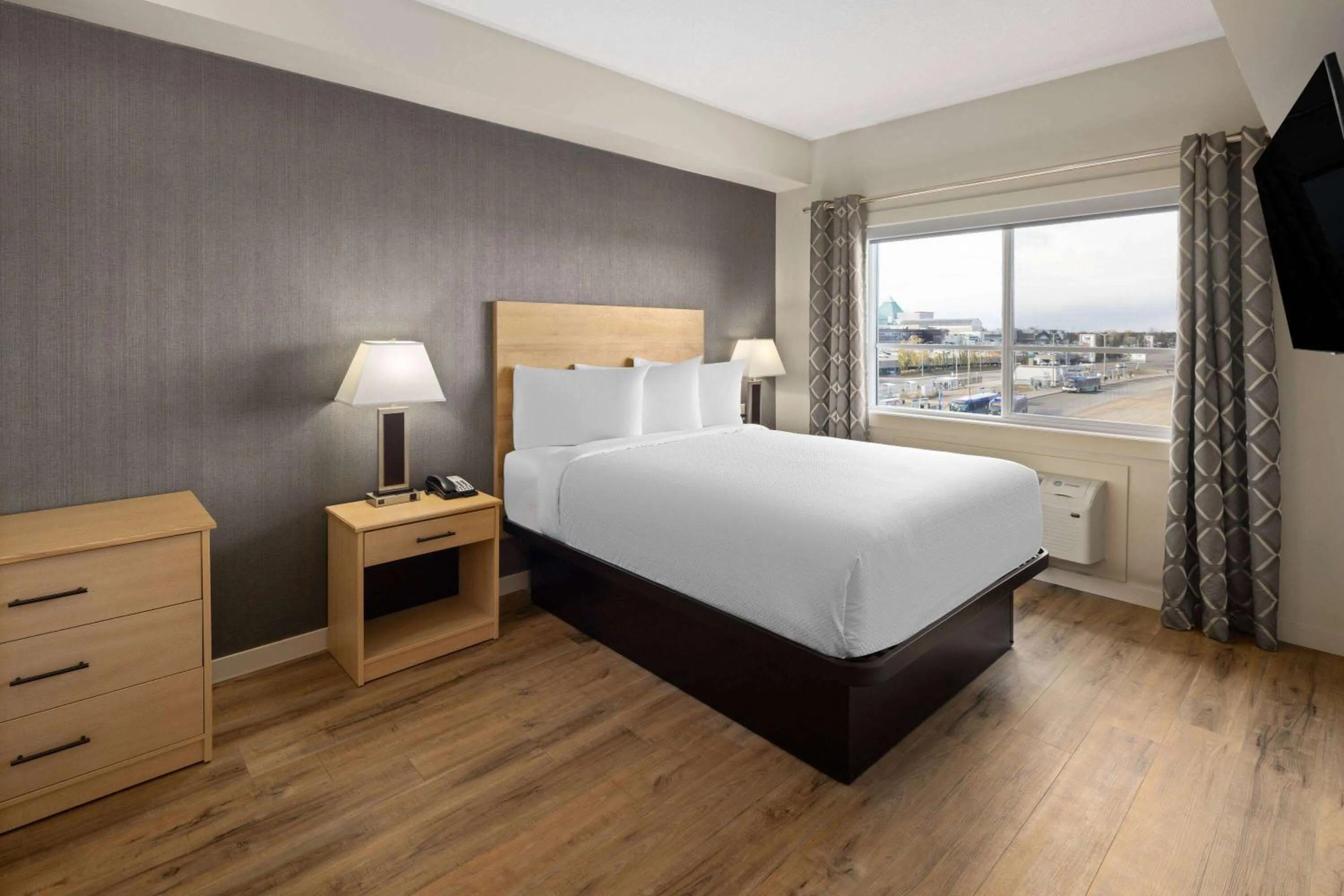 Two-Bedroom Loft Junior Suite with One King Bed and Two Queen Beds - Non-Smoking in Baymont by Wyndham West Edmonton