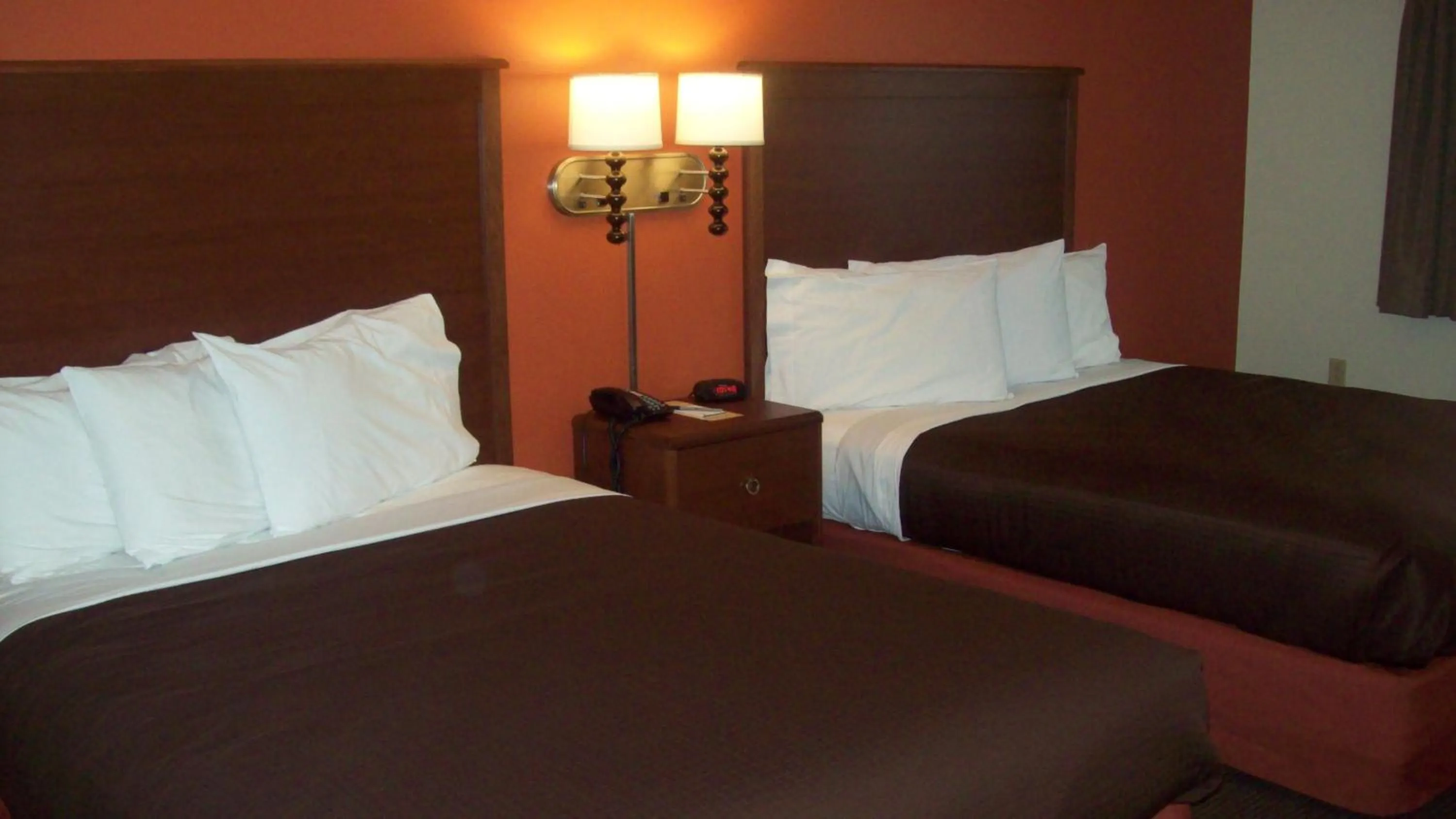 Queen Room with Two Queen Beds and Lake View - Non-Smoking in AmericInn by Wyndham Silver City