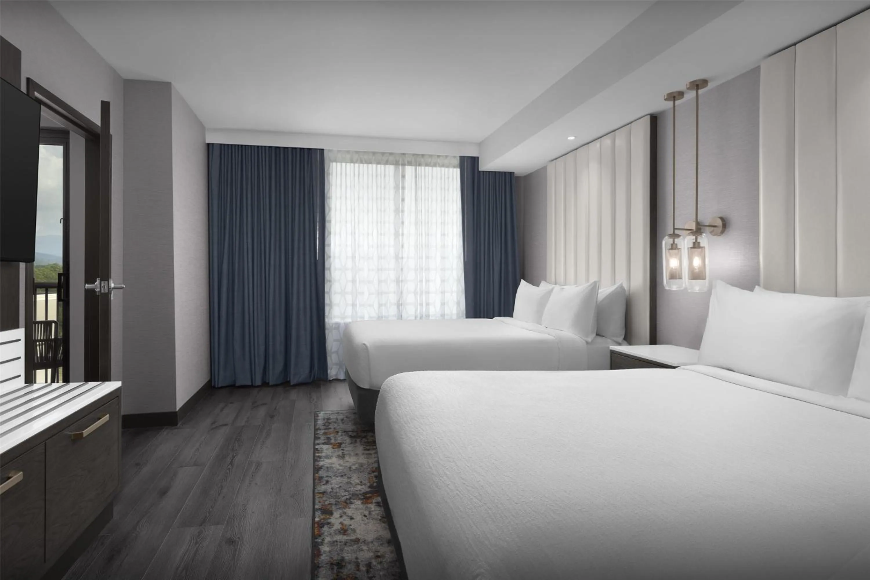 Two-Room Suite with Two Queen Beds and Balcony in Embassy Suites By Hilton Pigeon Forge Resort