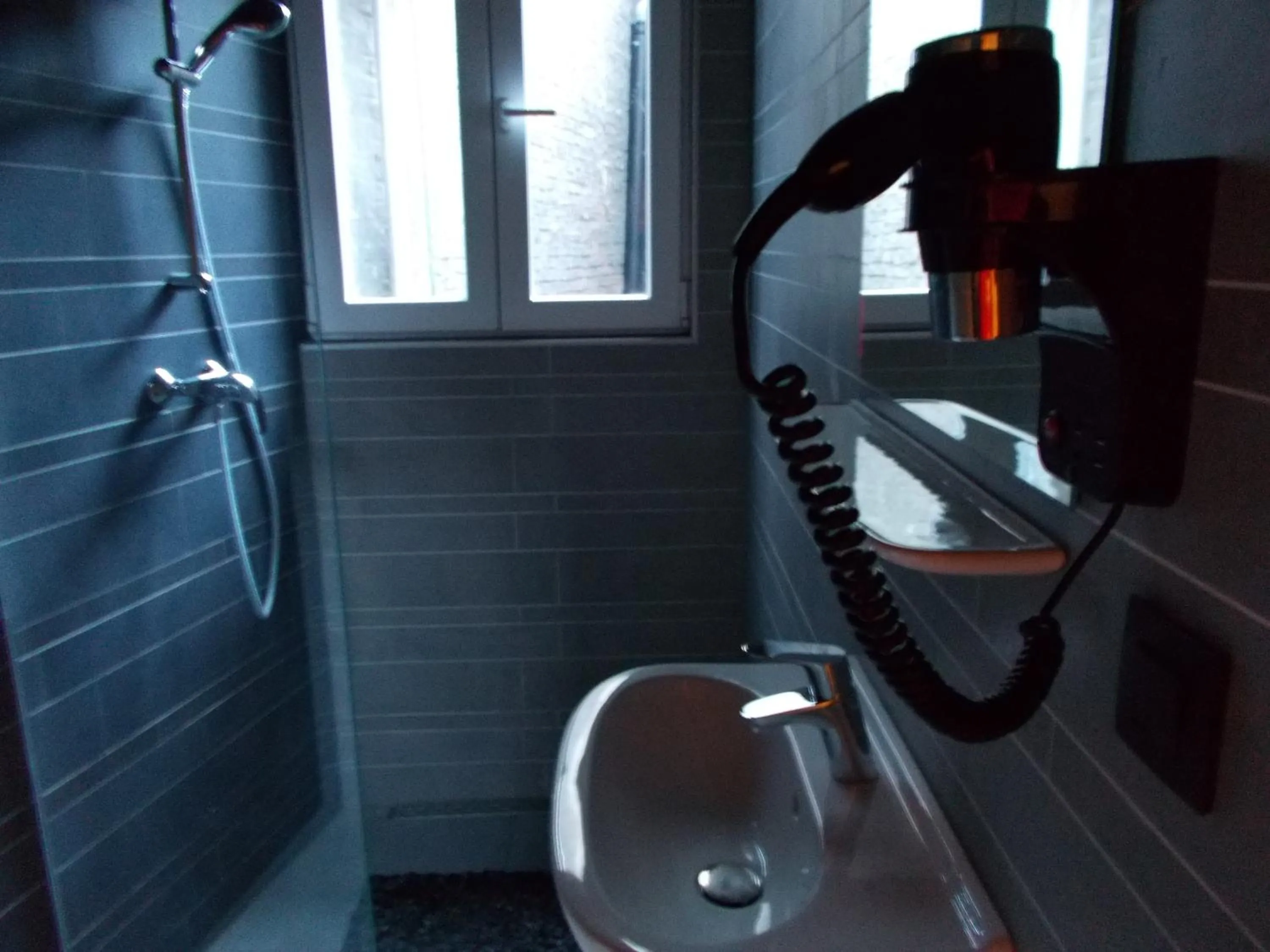 Quadruple Room with Bathroom in Urban City Centre Hostel