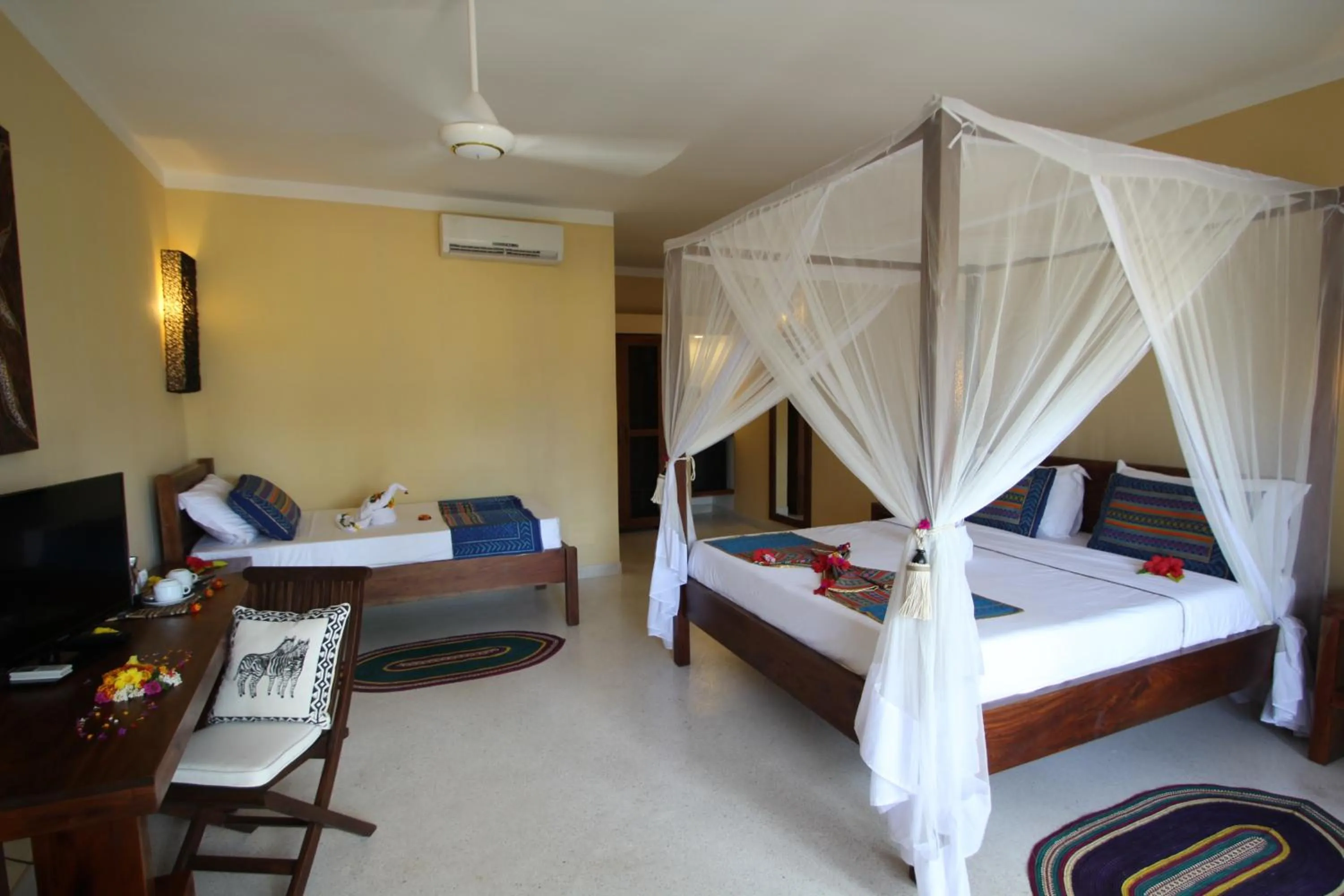 Deluxe Triple Room in Fruit & Spice Wellness Resort Zanzibar