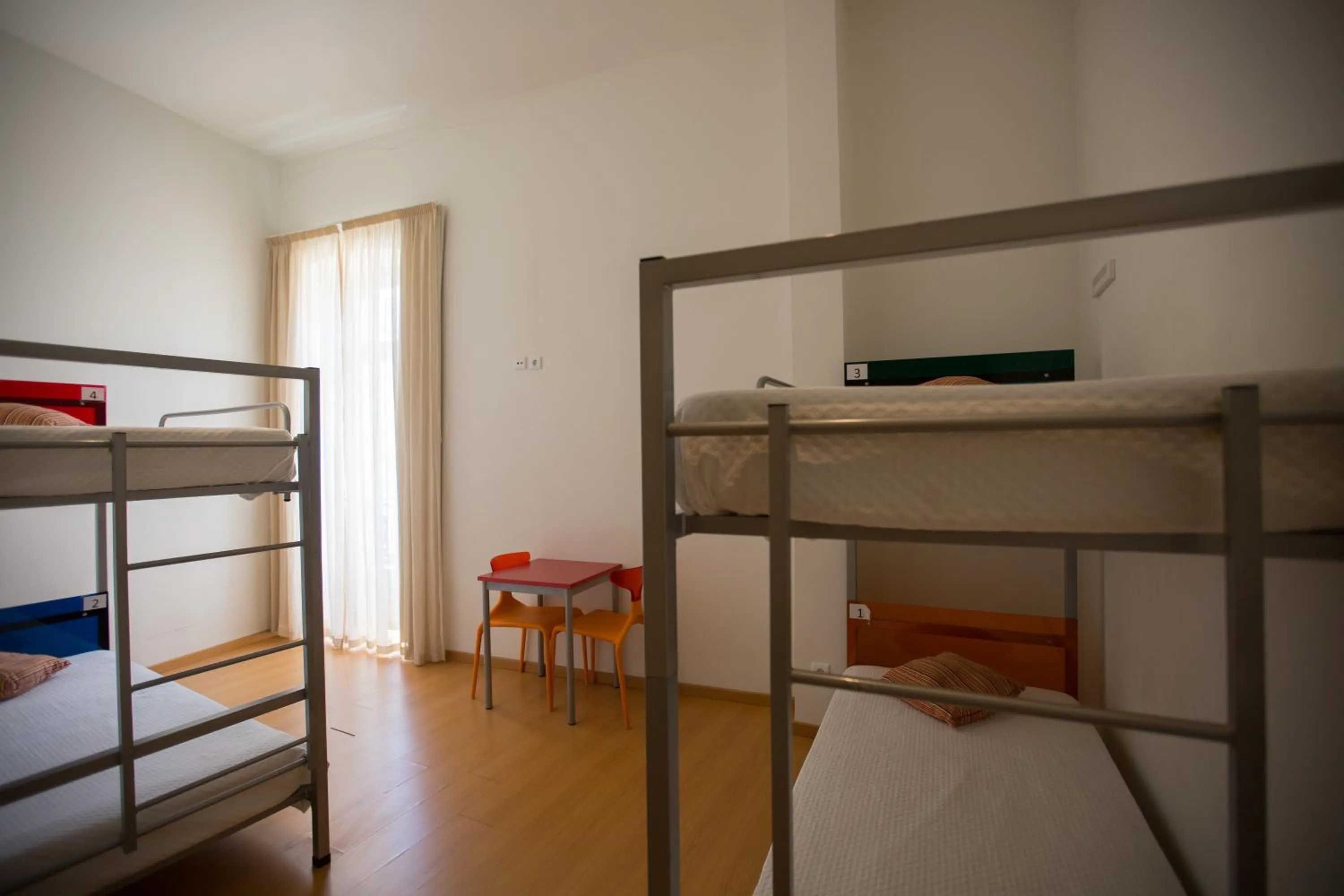 Bed in 4-Bed Male Dormitory Room in HI Tavira – Pousada de Juventude