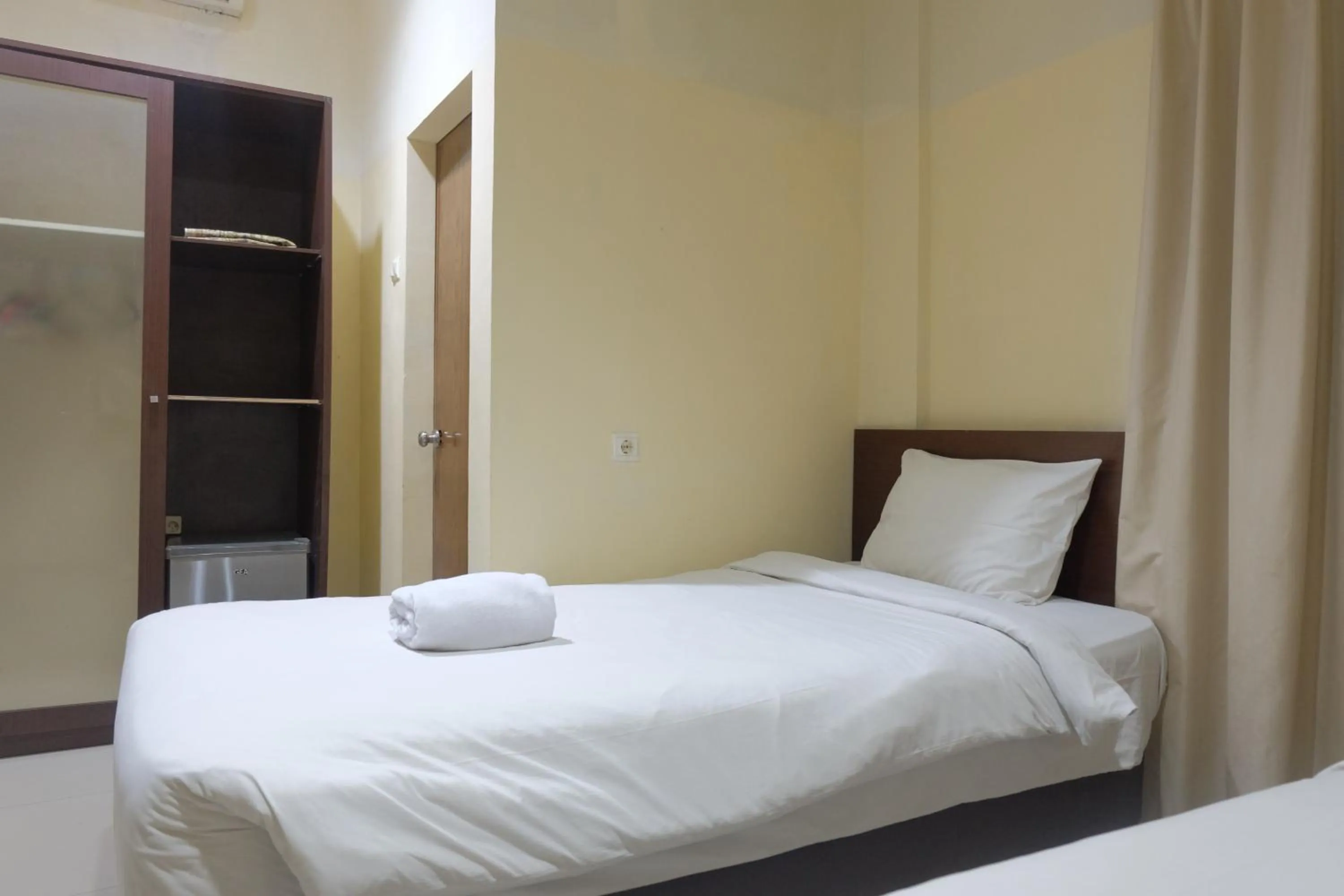 Deluxe Twin Room in De Nusantara Hotel Syariah