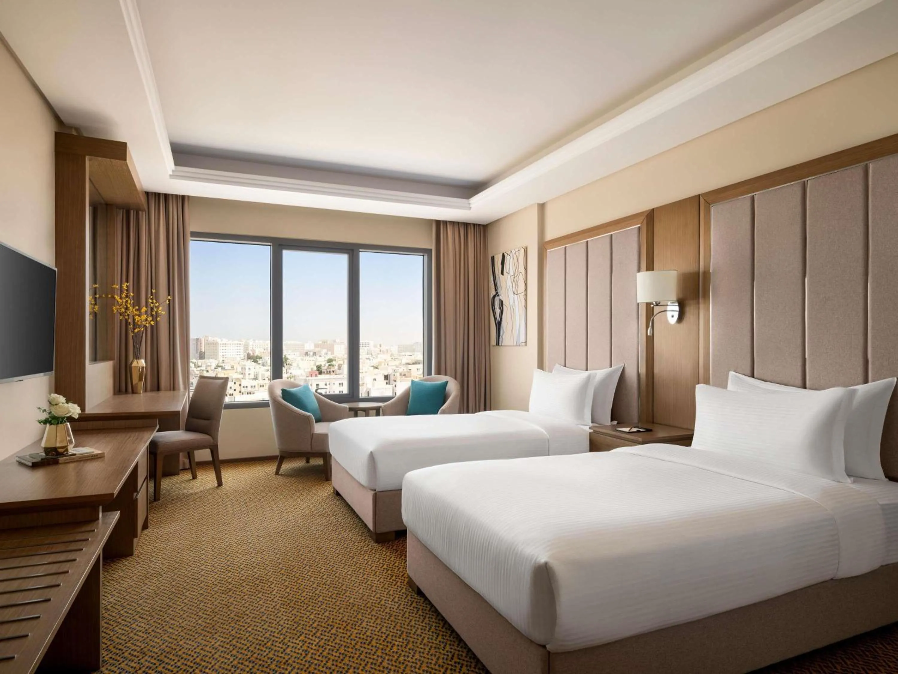 Deluxe Twin Room with Sea and City View in Mercure Muscat