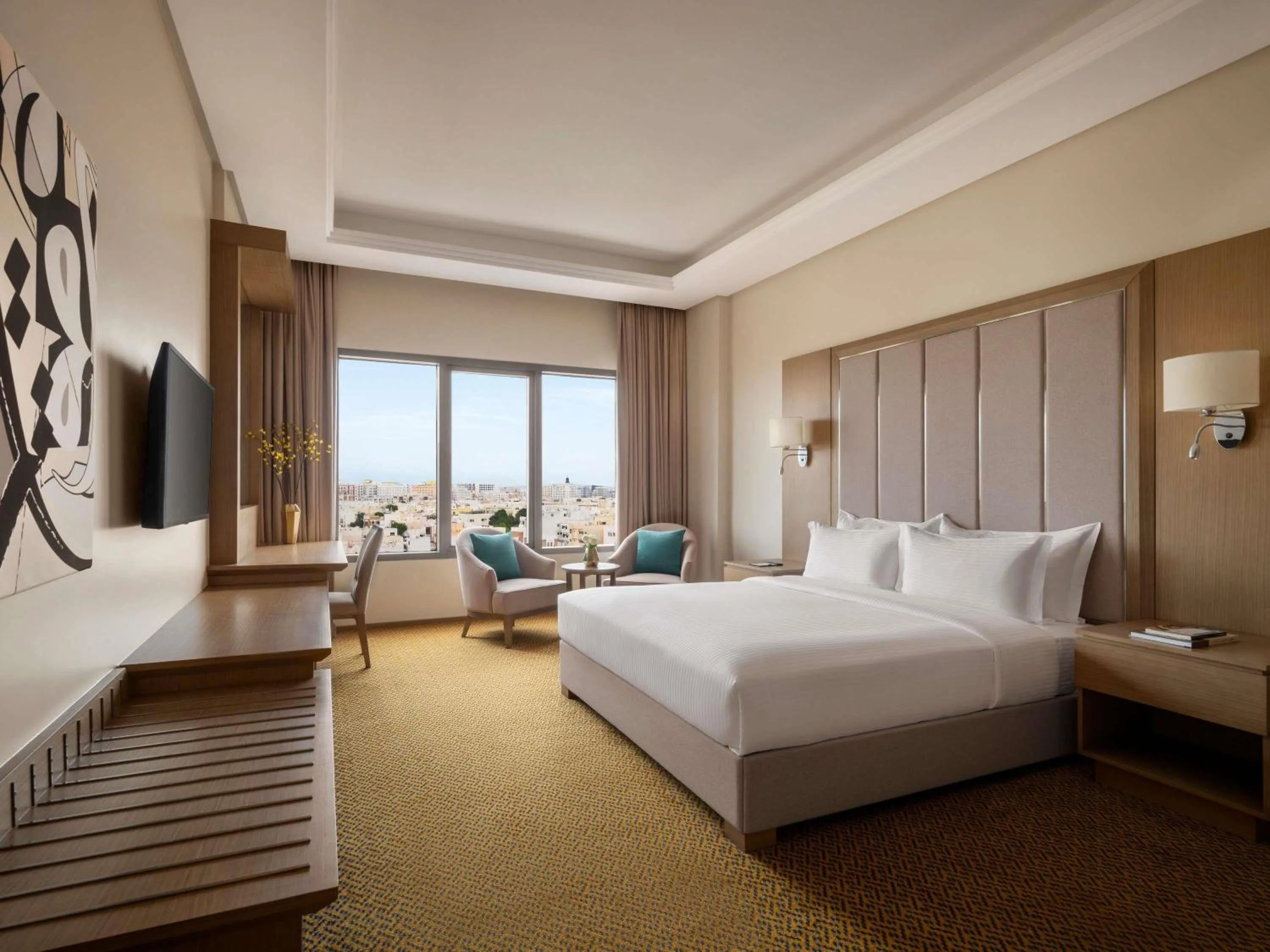 Deluxe King Room with Sea and City View in Mercure Muscat