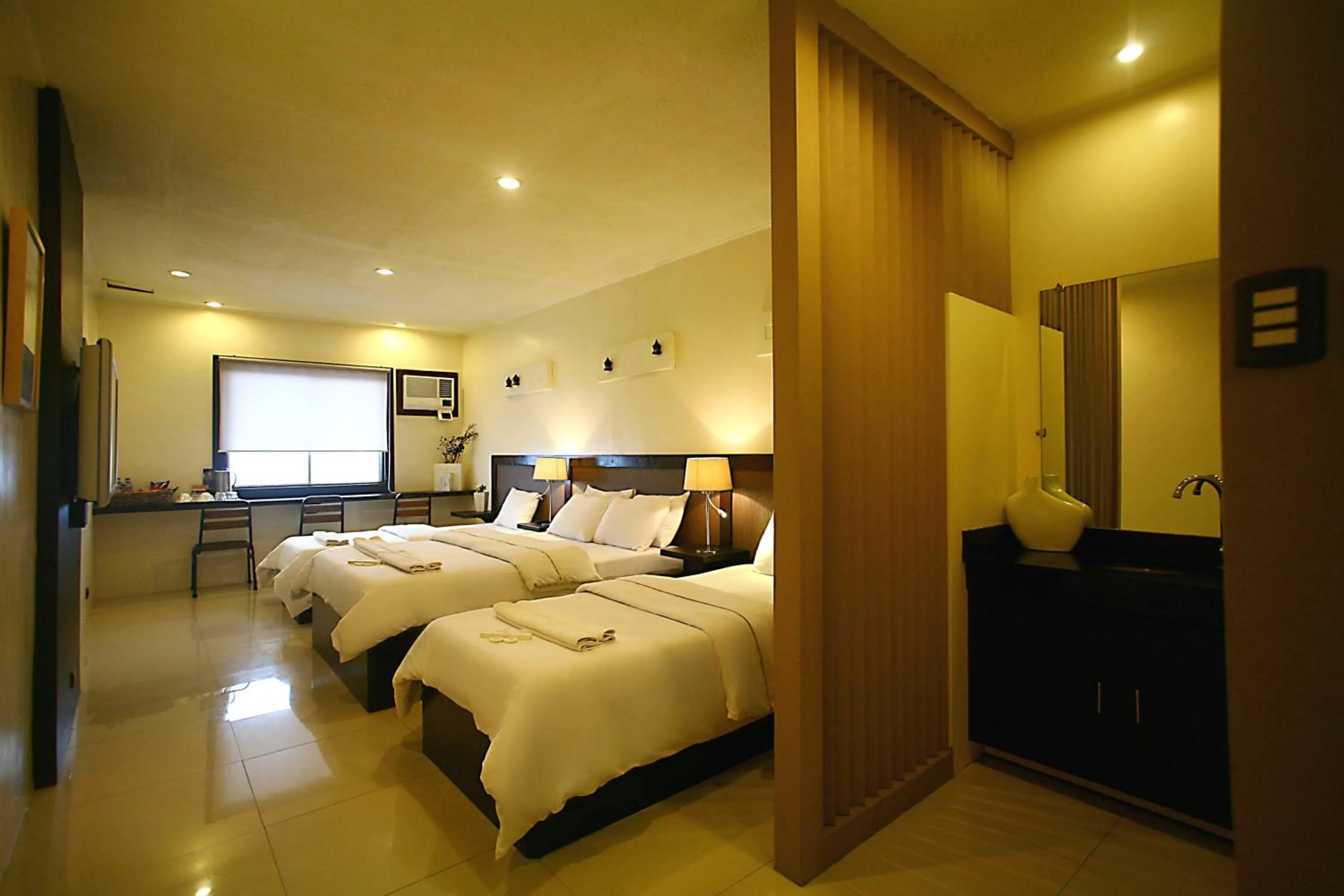Deluxe Quadruple Room in Baguio Holiday Villas