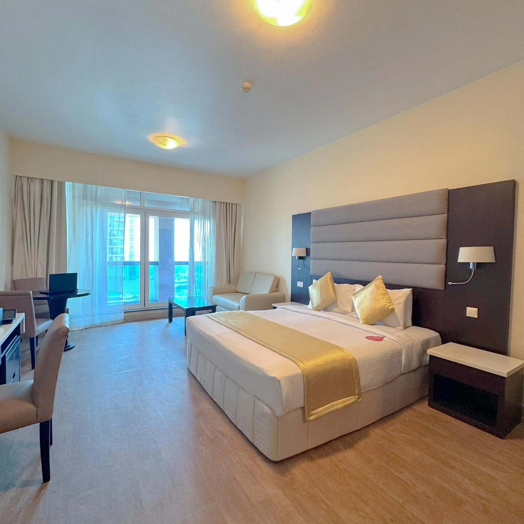Deluxe King Room With Burj Khalifa View in Emirates Grand Hotel
