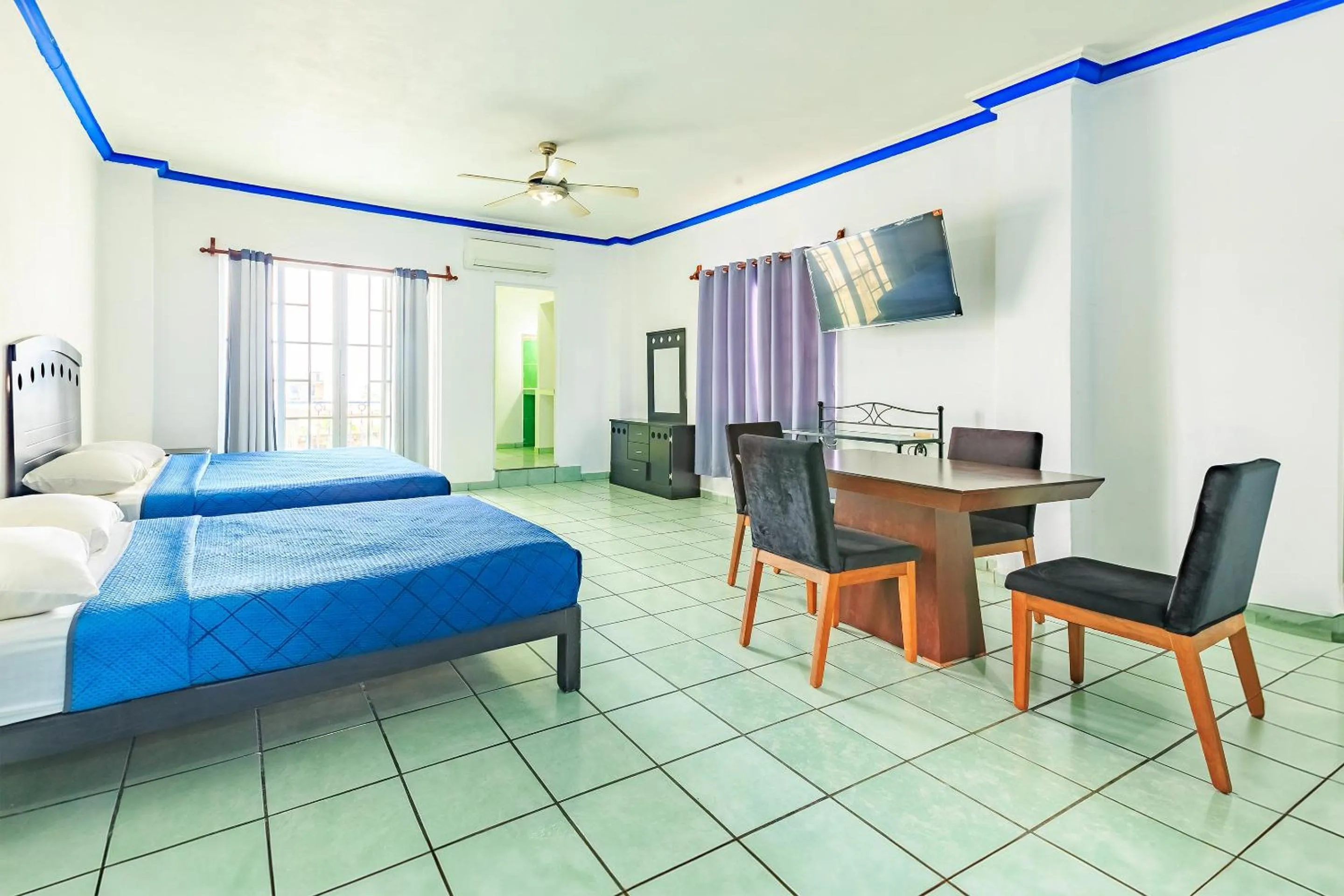 Deluxe Double Room with Two Double Beds in OYO Casa Mission