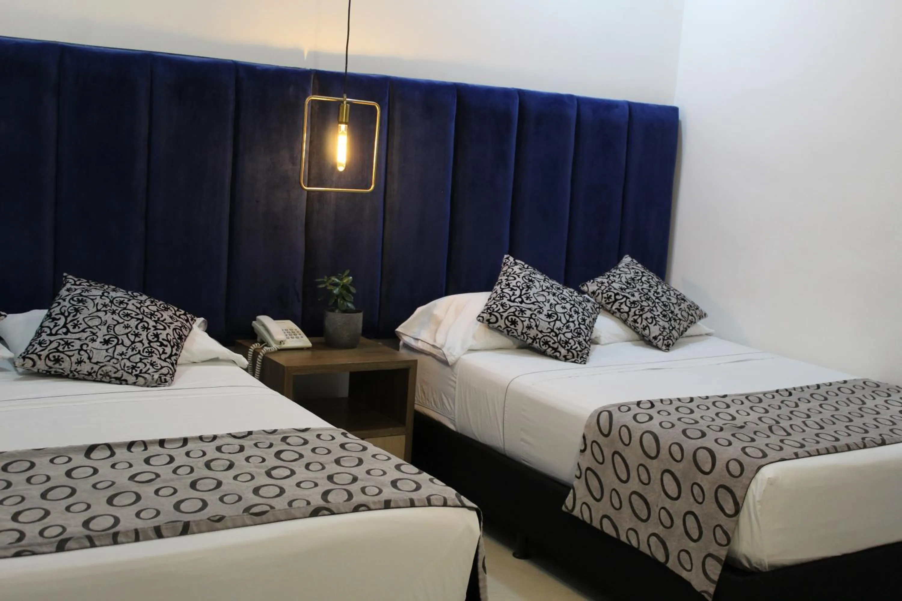 Classic Triple Room in Hotel Merlott Lleras