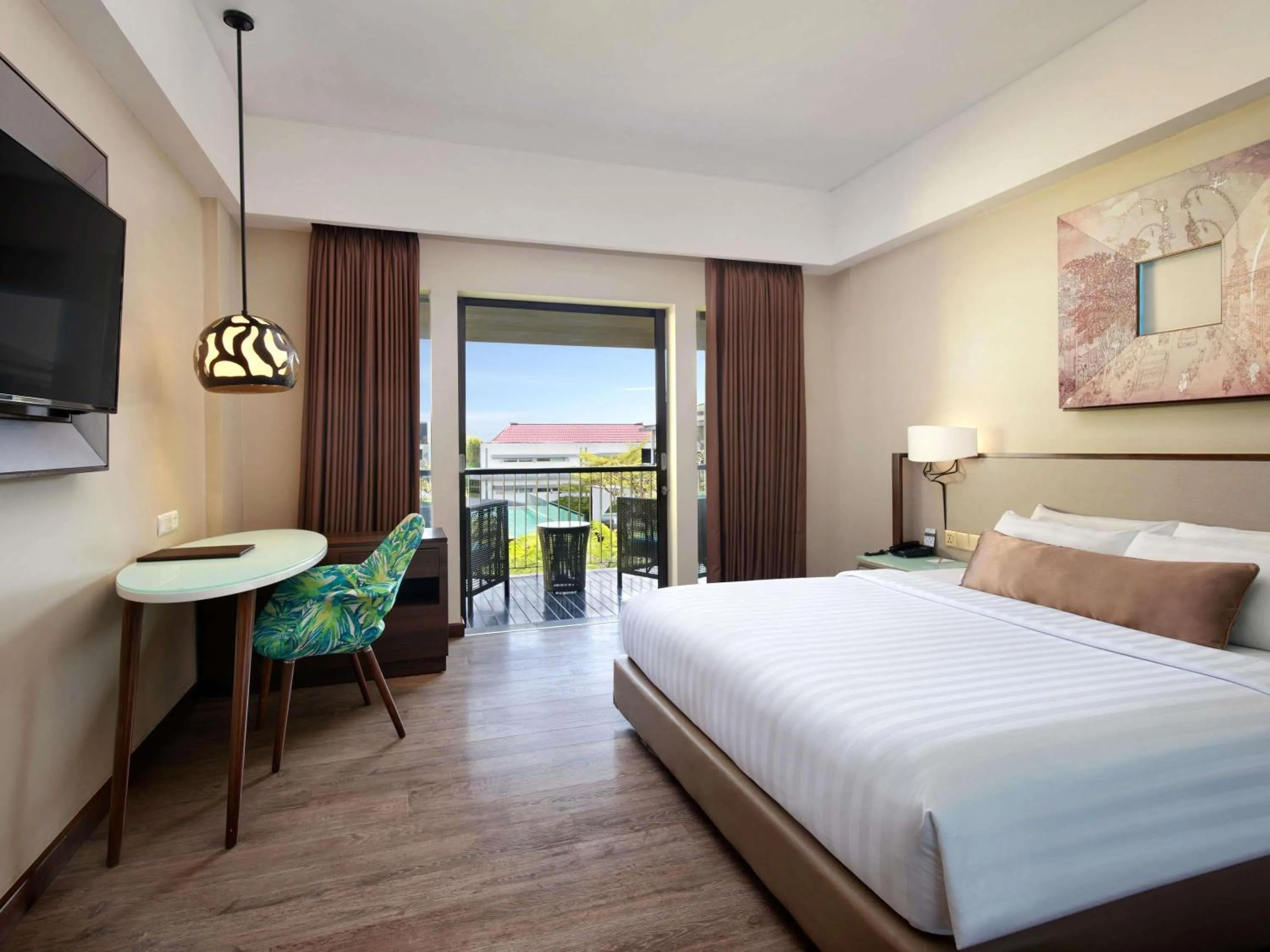 Deluxe Room with Balcony and Pool View in Mercure Bali Legian