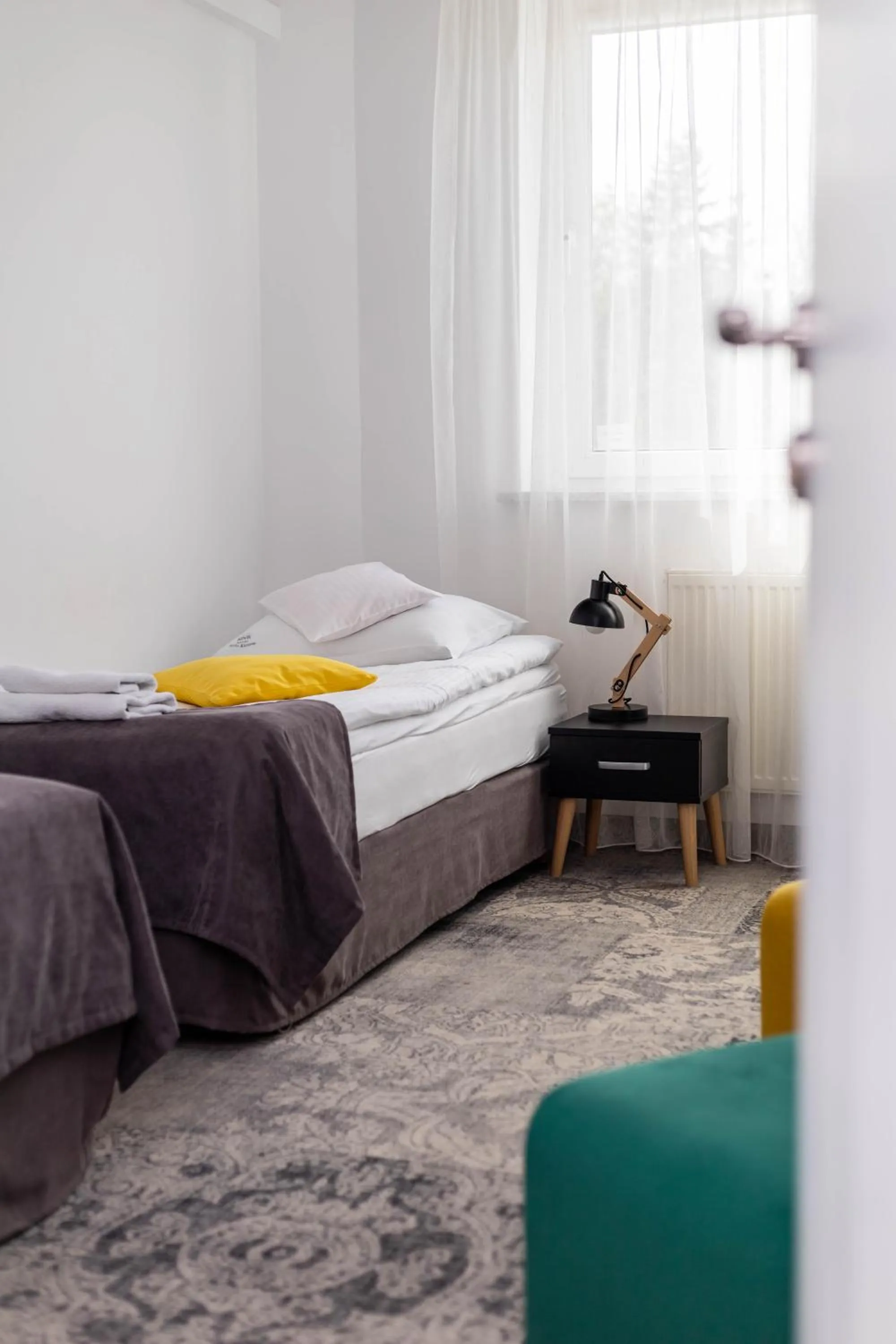 Economy Quadruple Room with Shared Bathroom in Hotel Nafta Krosno