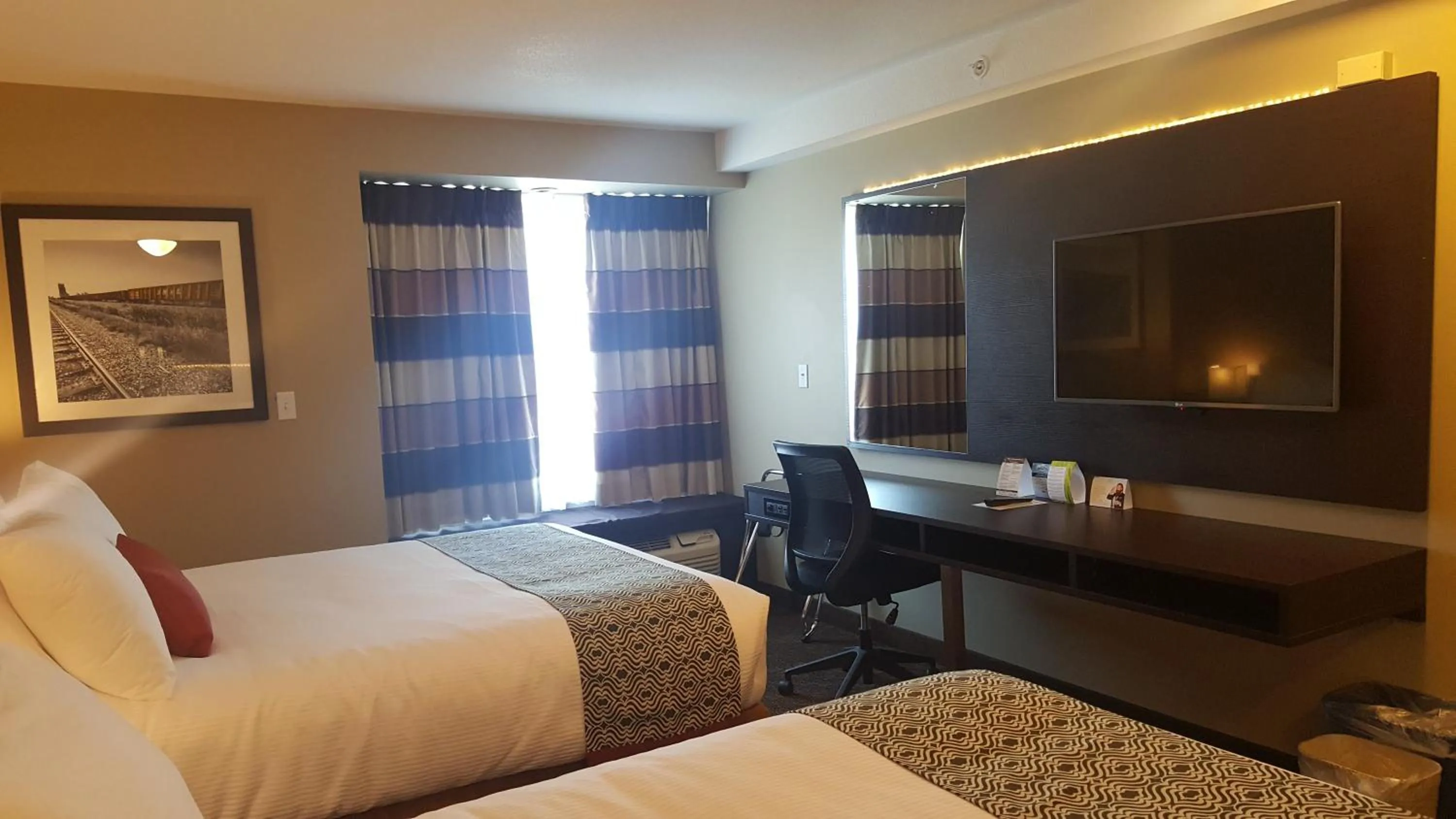 Queen Room with Two Queen Beds - Non-Smoking in Microtel Inn & Suites by Wyndham Whitecourt