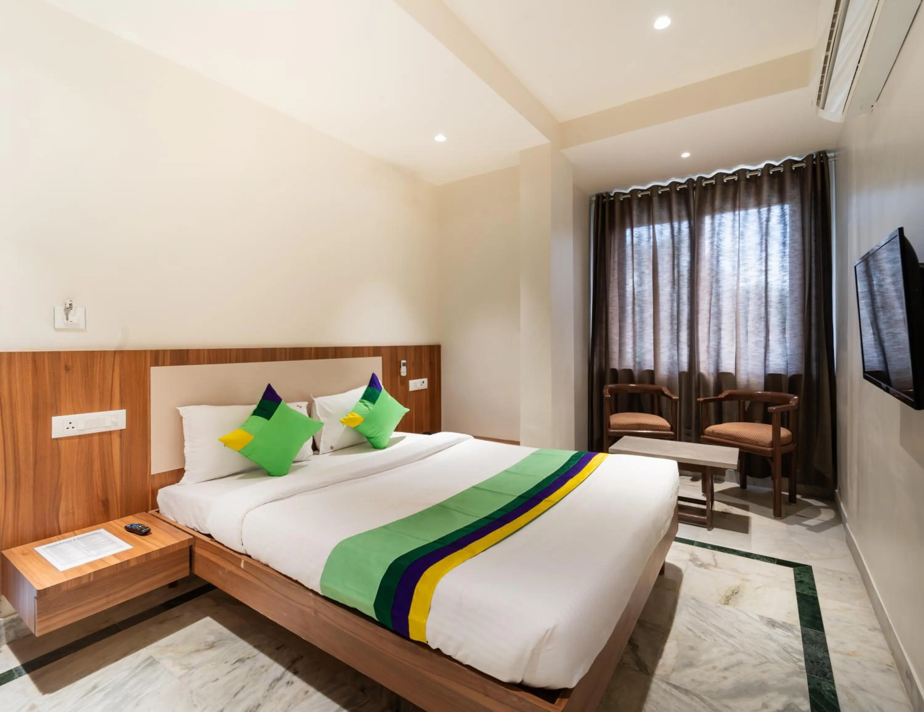 Deluxe Room - single occupancy in Treebo Kaveri