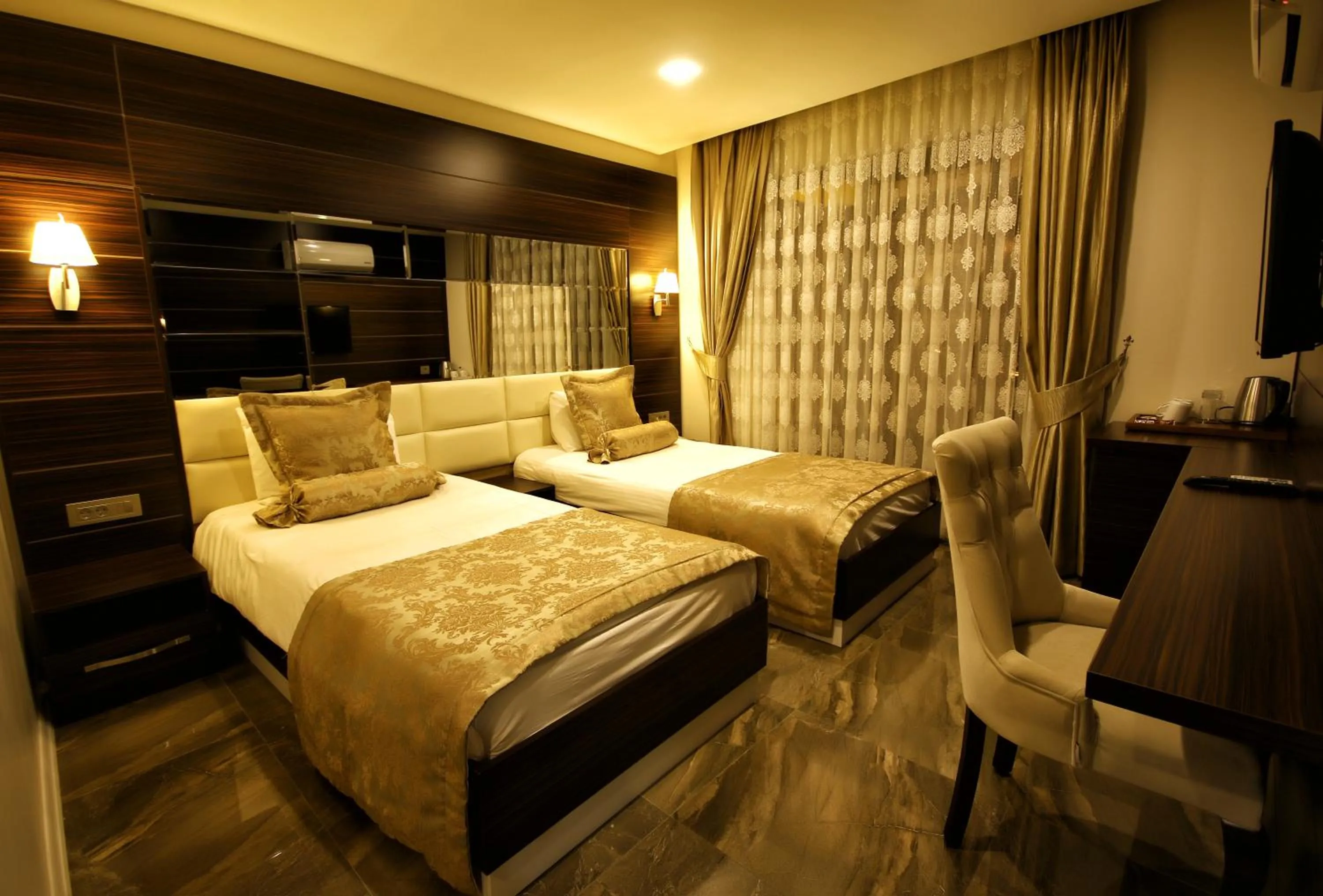 Twin Room in Venus Suite Hotel