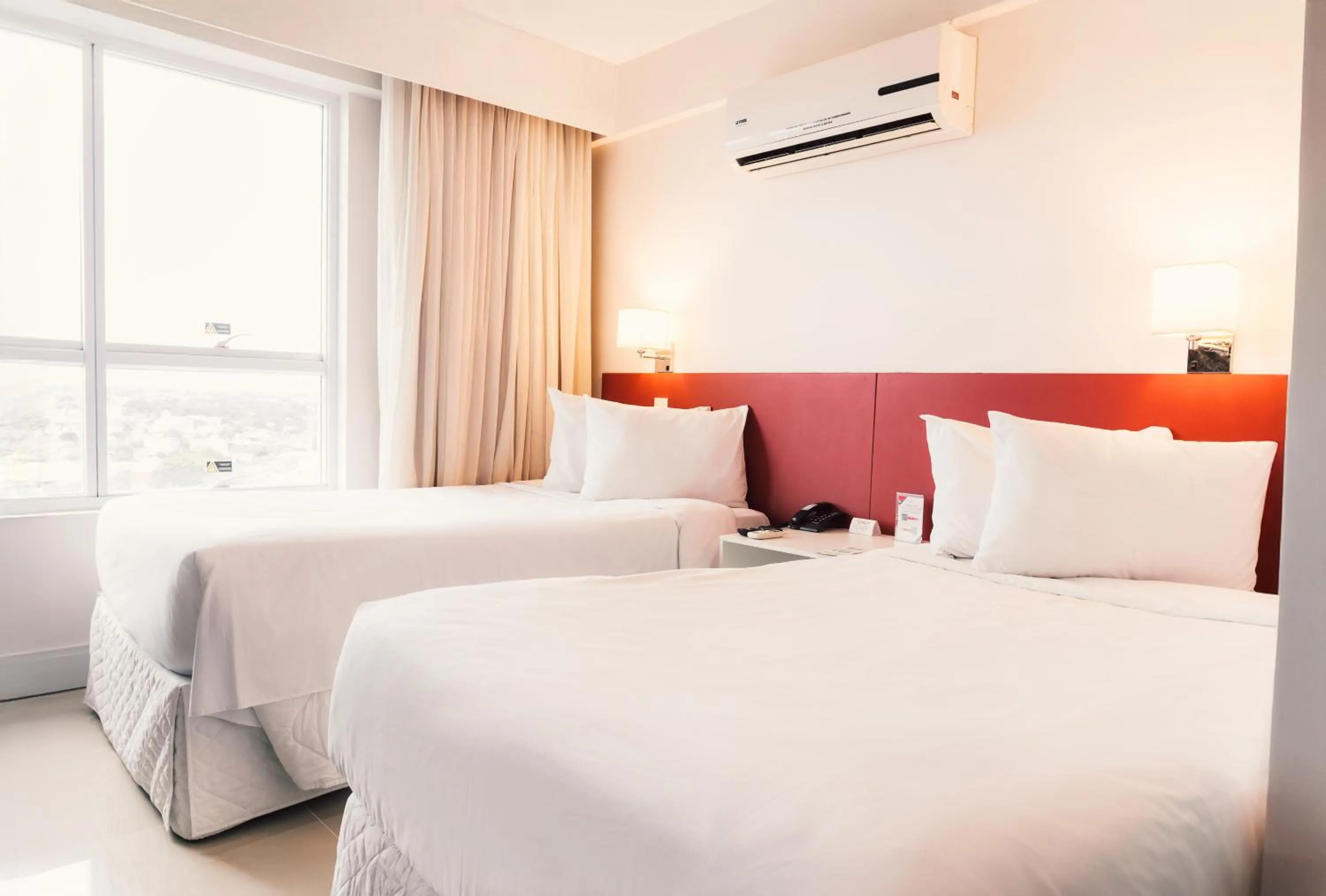 Superior Twin Room in Ramada Hotel & Suites Campos Pelinca