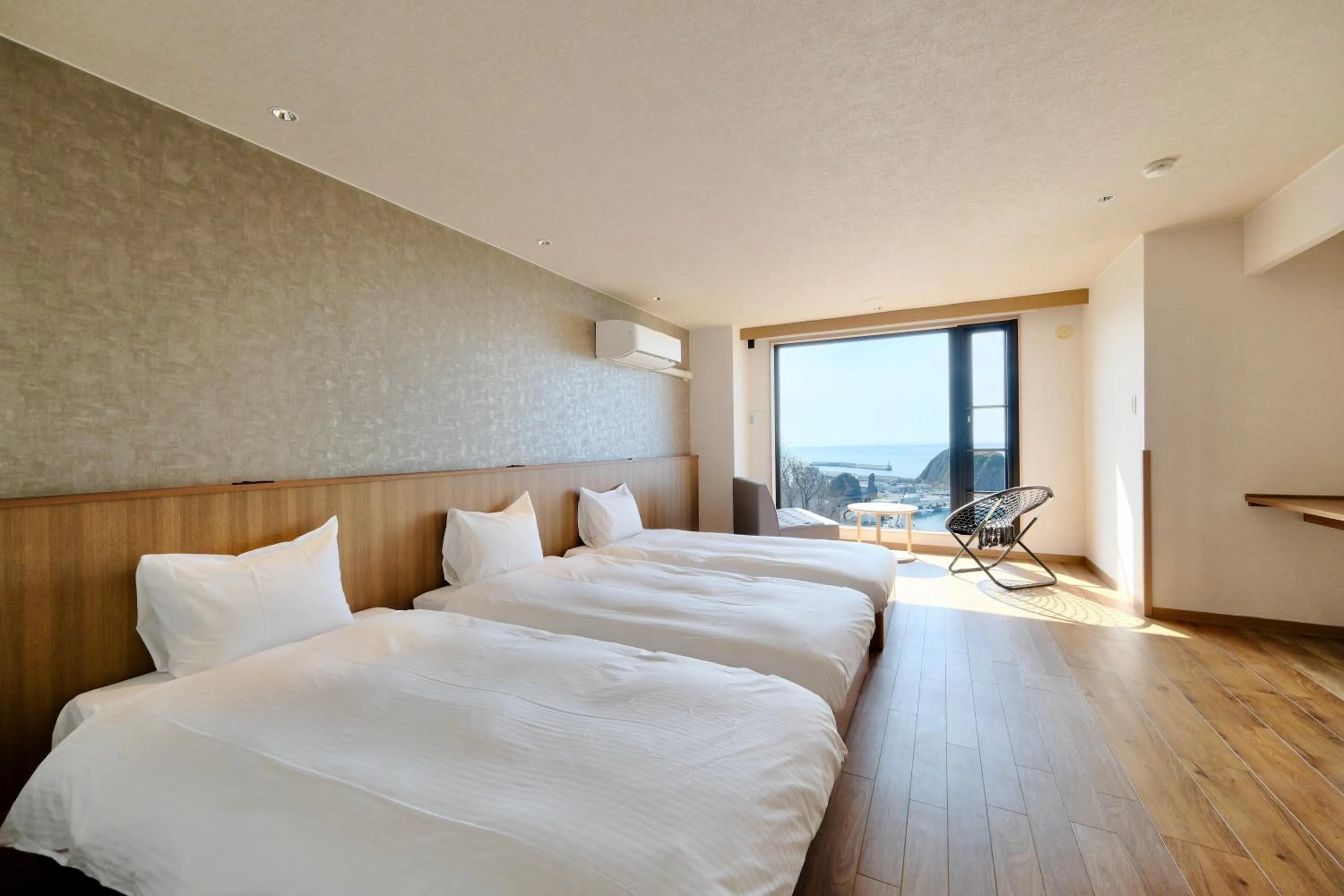 Triple Room with Shared Bathroom - single occupancy in Shiretoko Yuhi No Ataruie Onsen Hostel