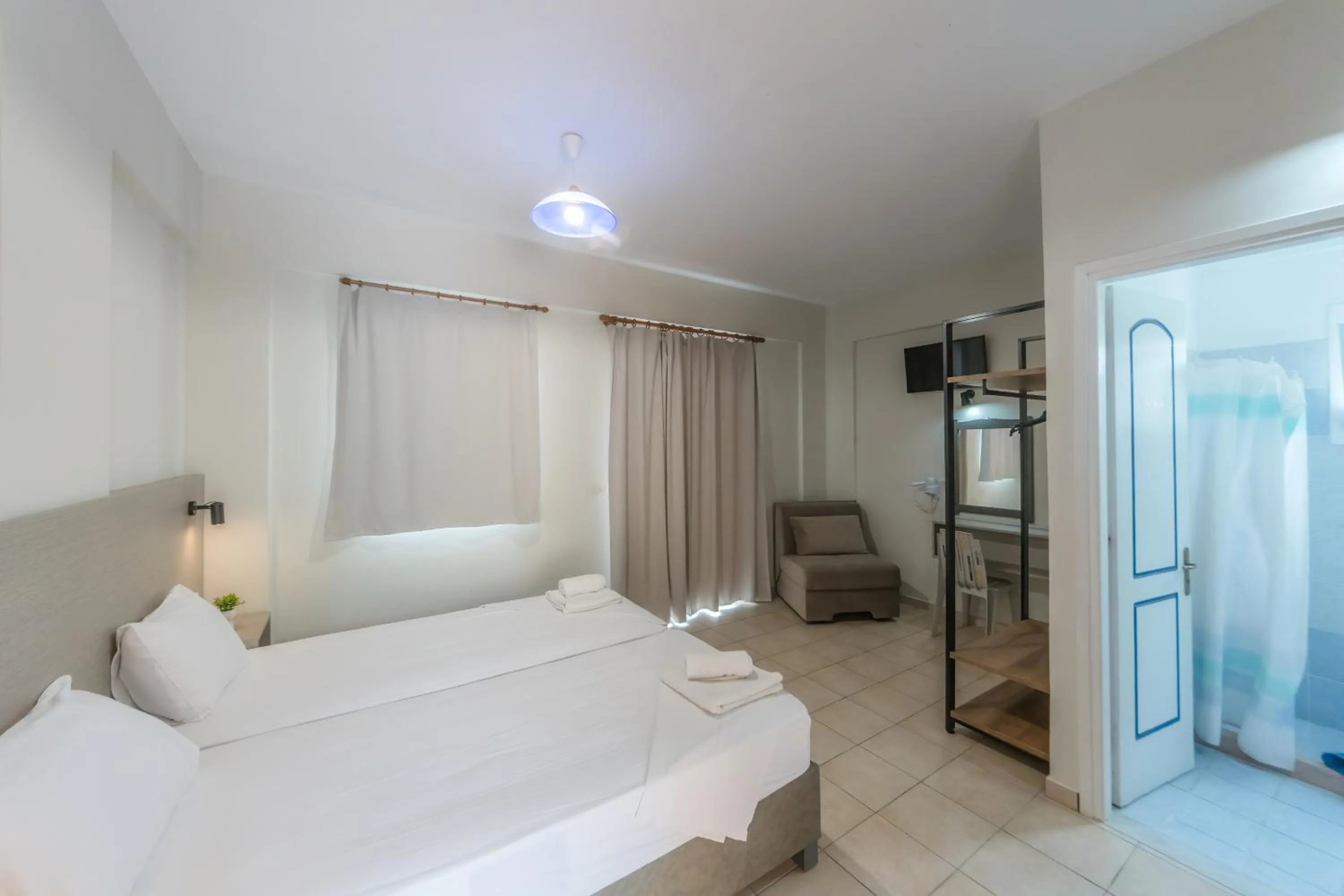 Triple Room with View in Nikos Villas