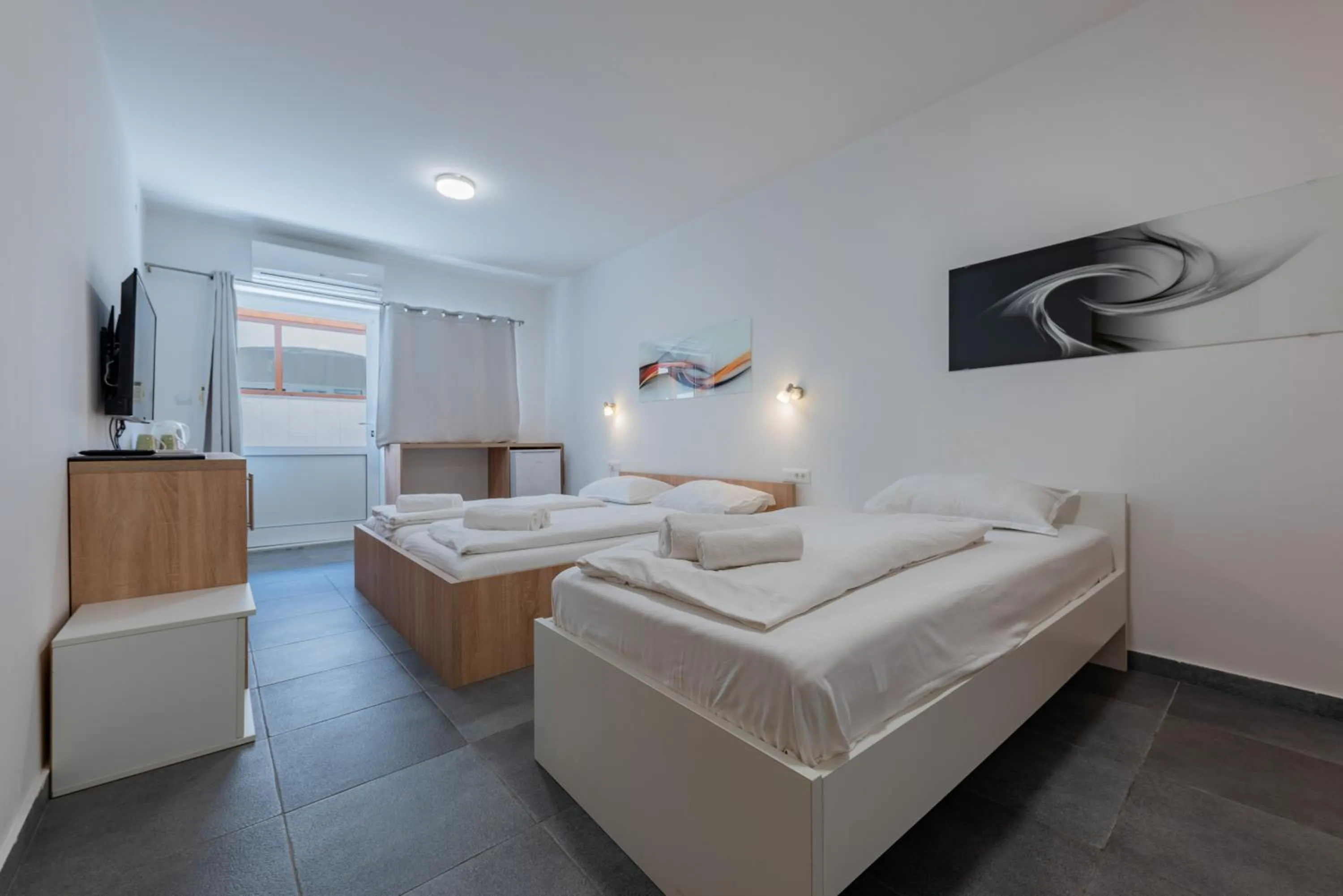 Comfort Triple Room with Patio in Aparthotel Plat