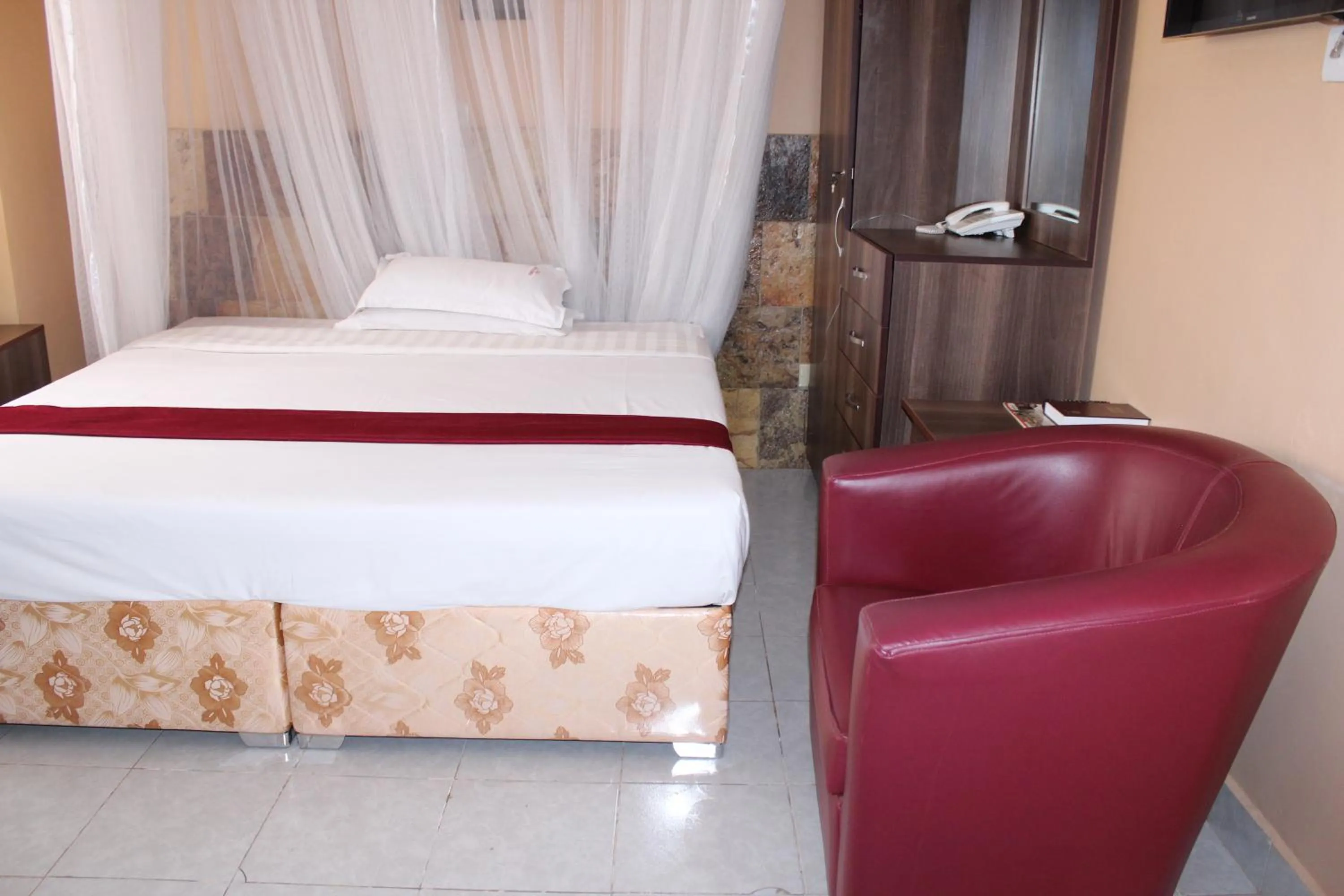 Queen Room in Eureka Place Hotel Kampala