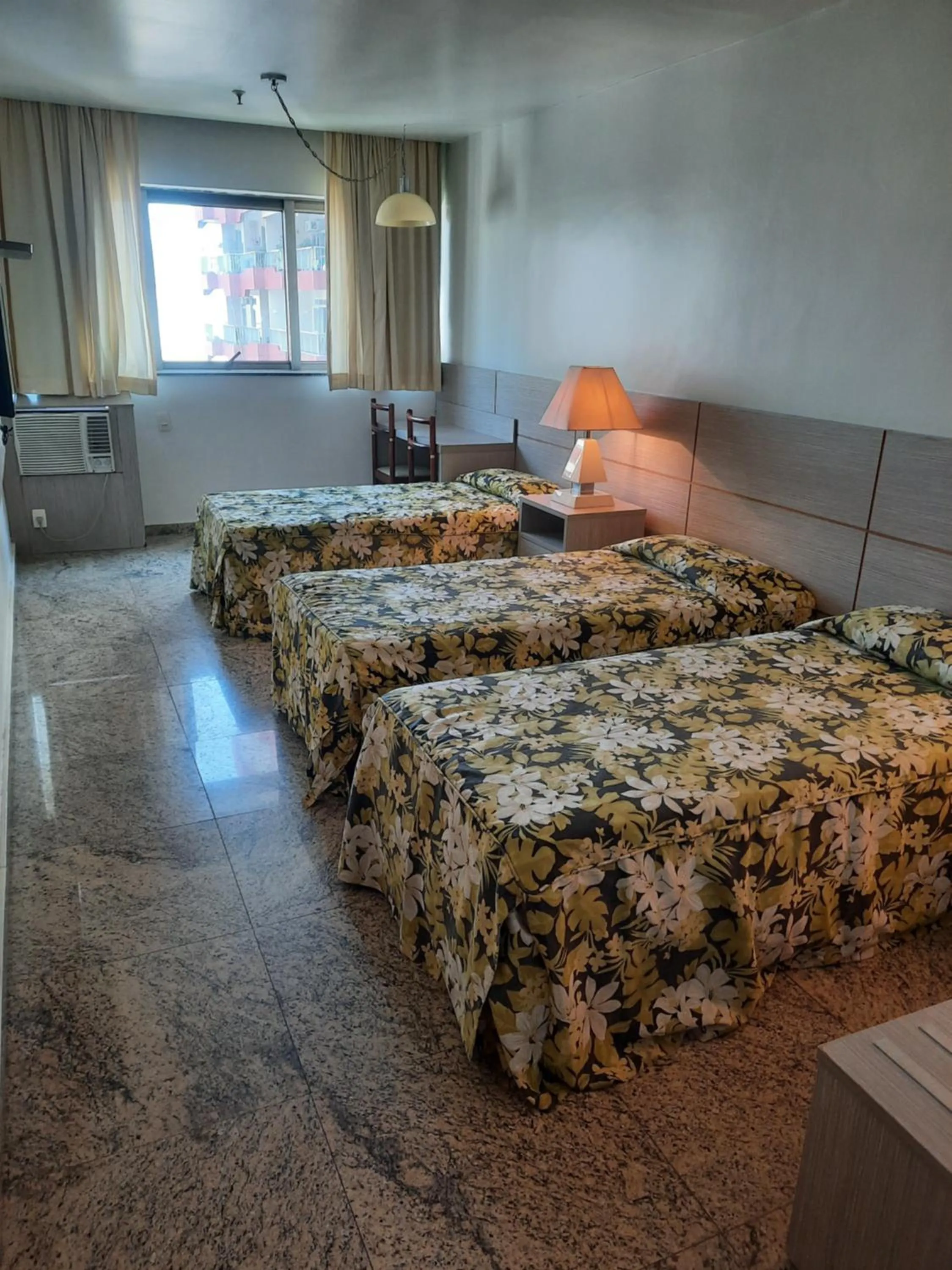 Standard Triple Room in Royalty Copacabana Hotel