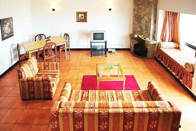 Family Suite with Balcony in Woodsvilla Resort Ranikhet
