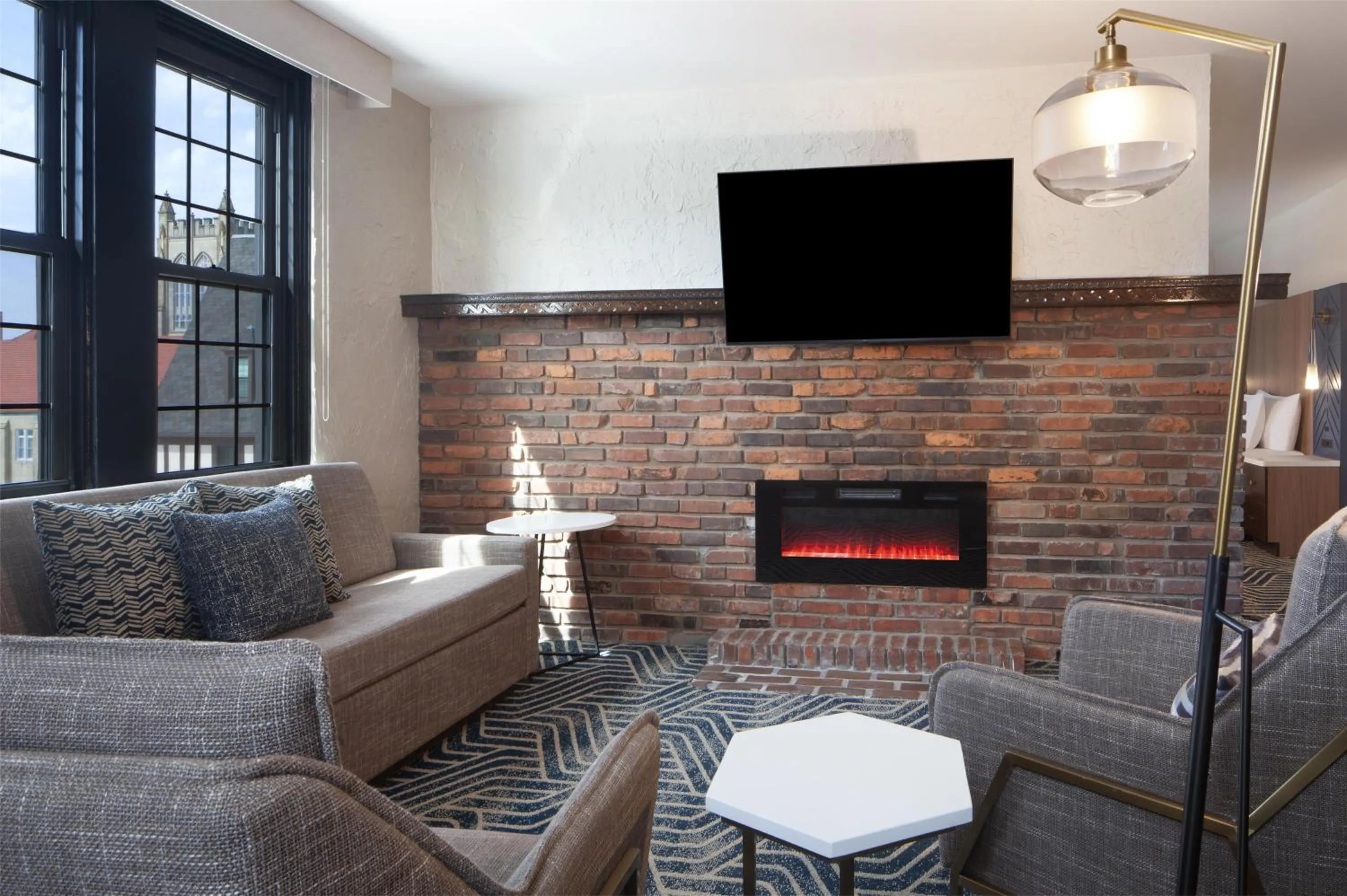 King Studio Suite with Fireplace in Hotel Royer Urbana Champaign, Tapestry Collection by Hilton