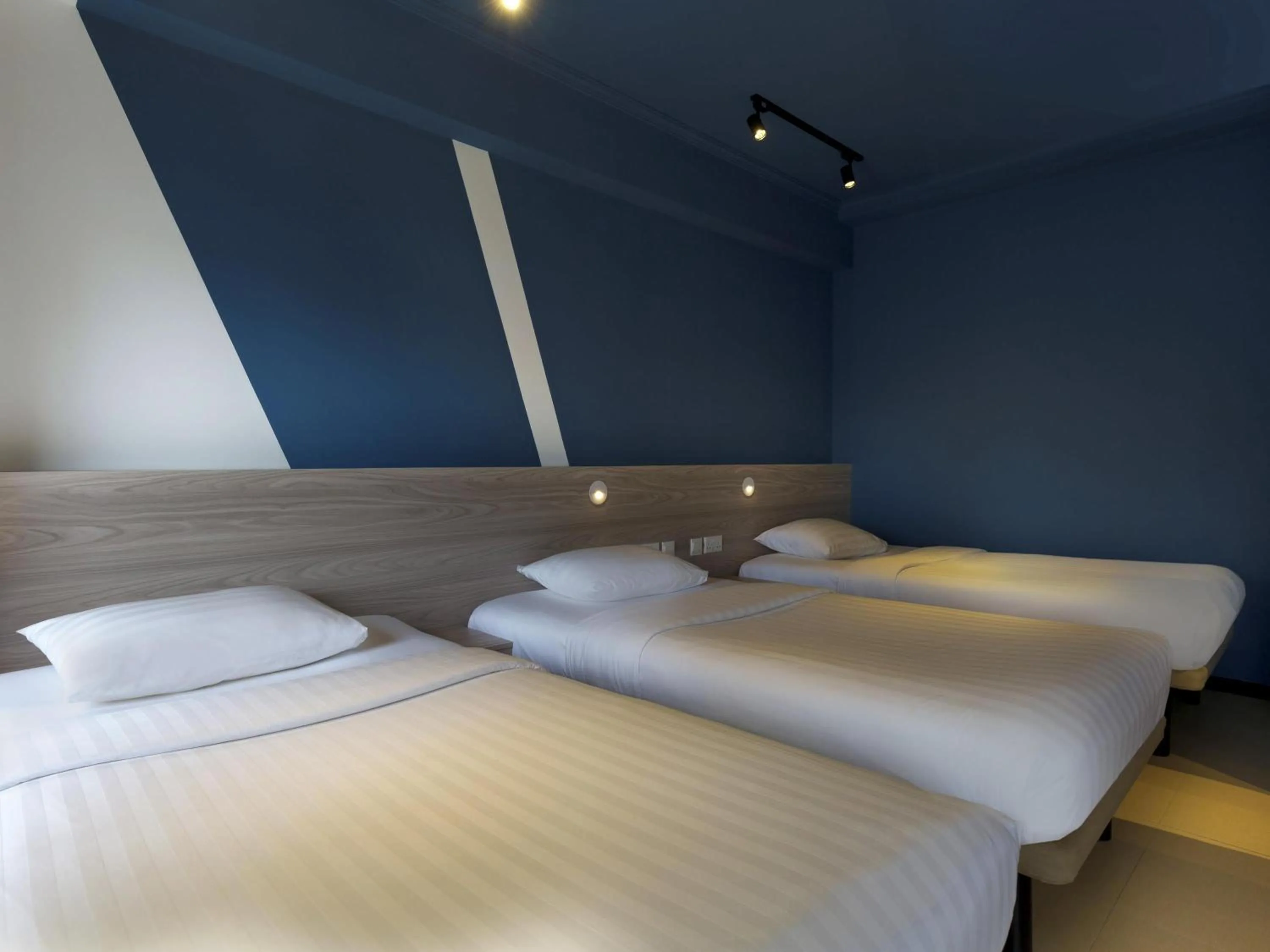 Family Room with Three Single Bed in ibis budget Phnom Penh Riverside