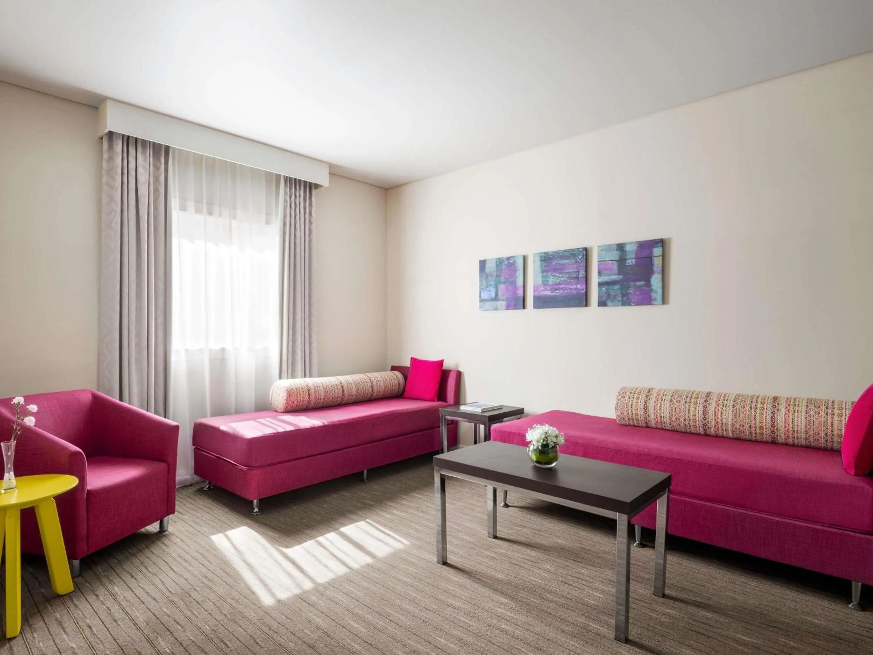 Classic Family Room with one queen bed and two sofa beds. in ibis Styles Sharjah