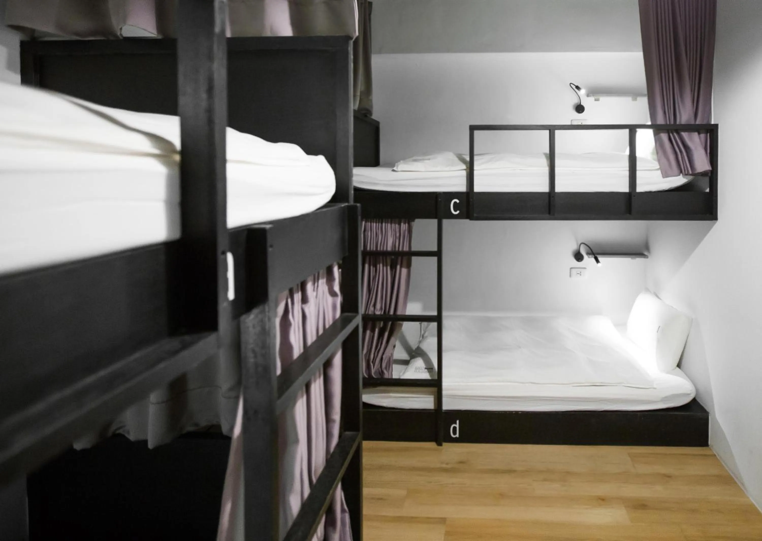 Economy Quadruple Room with Shared Bathroom in We Come Hostel