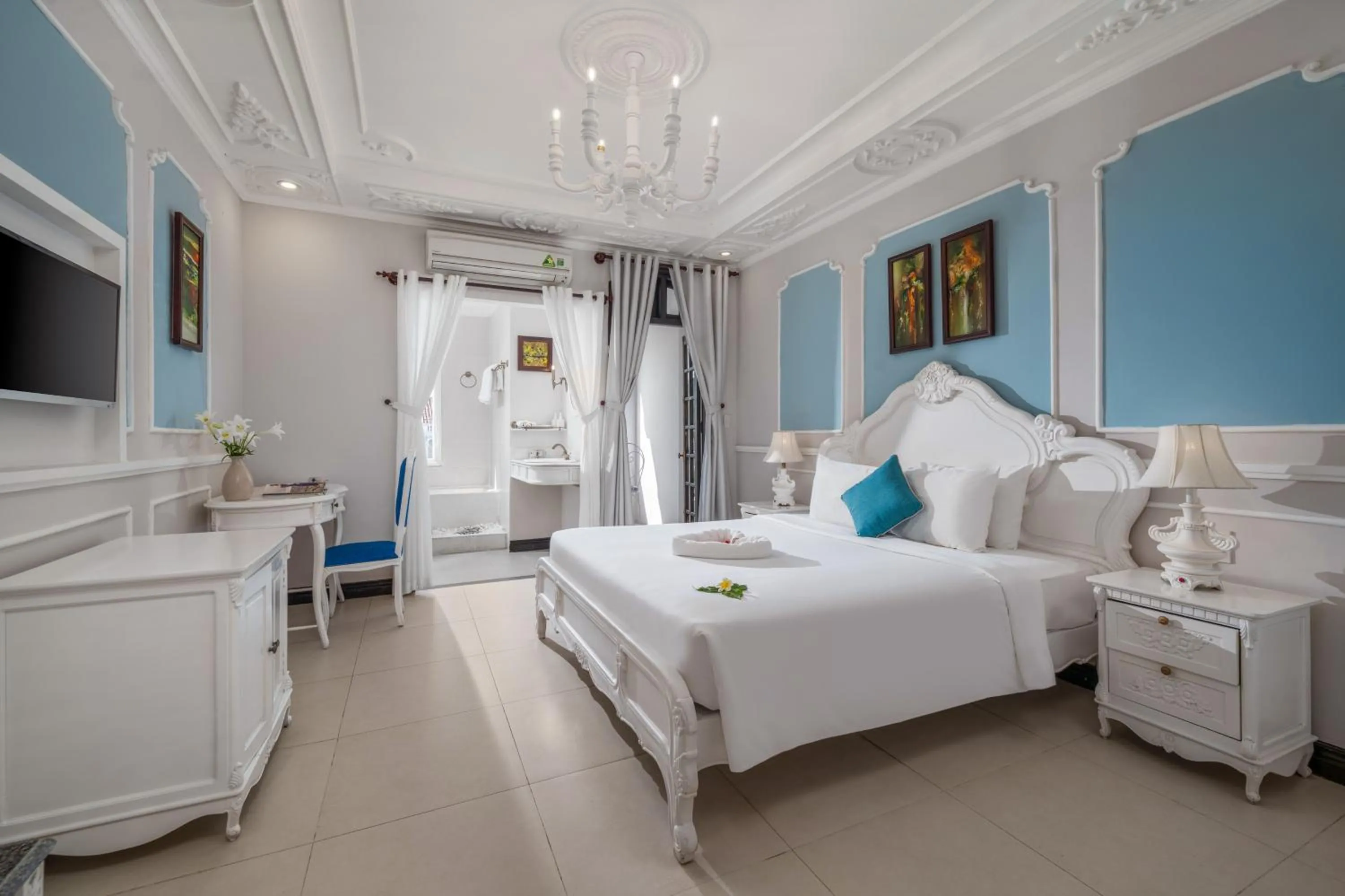 Family Room (4 Adults) with Balcony in Hoi An Garden Palace and Spa - A Boutique Inspired by Nature