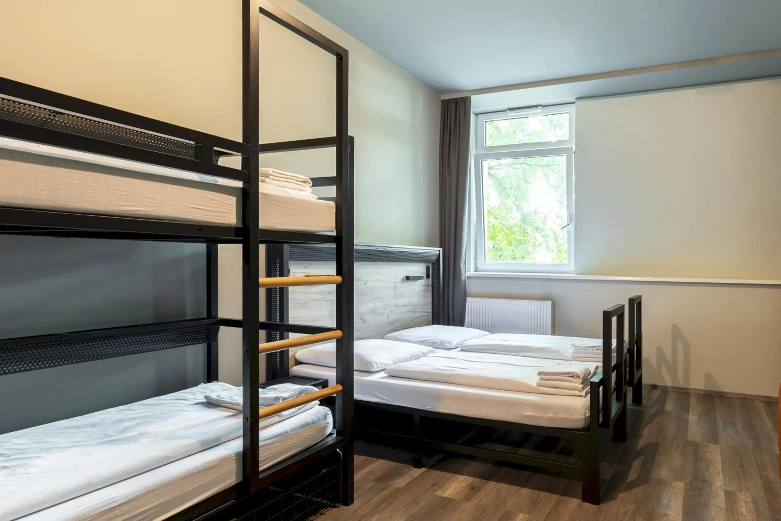 Family Room (2 Adults + 2 Children) in a&o Stuttgart City