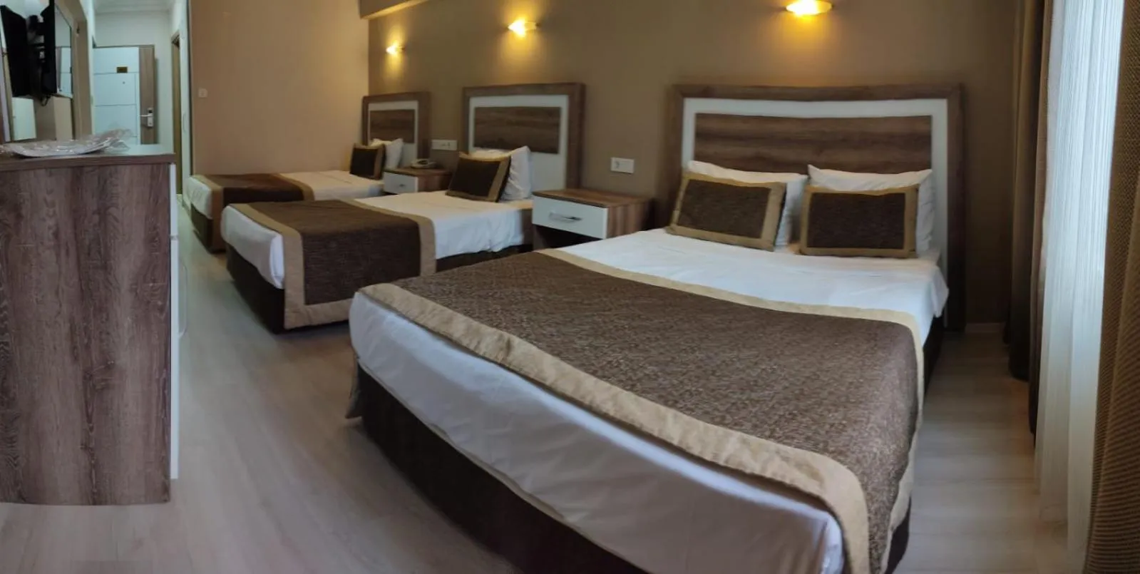 Luxury Quadruple Room in Dempa Hotel