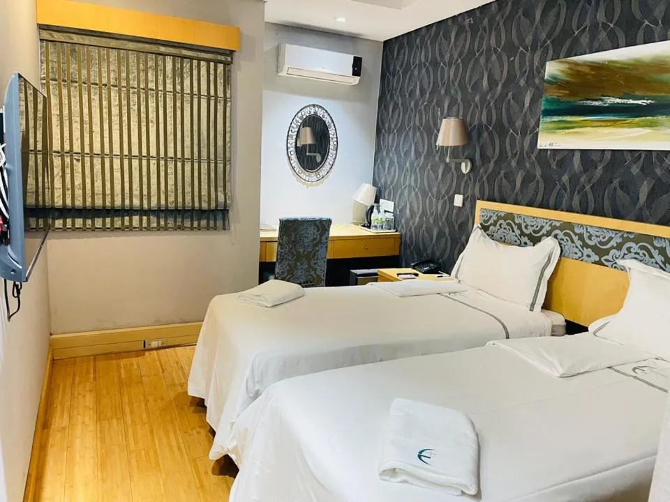 Twin Room in Aquarian Tide Hotel